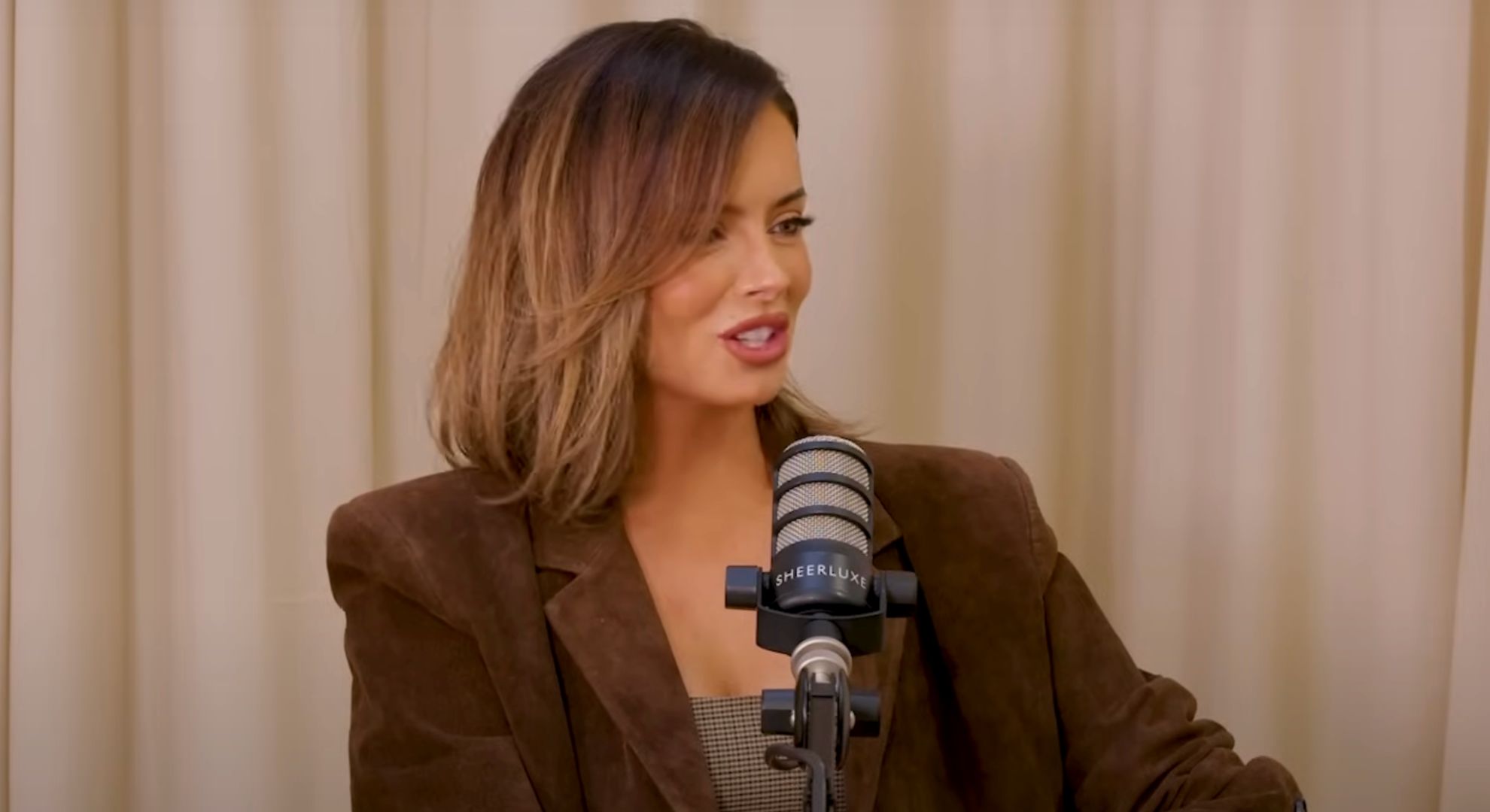 Maura Higgins on a podcast 