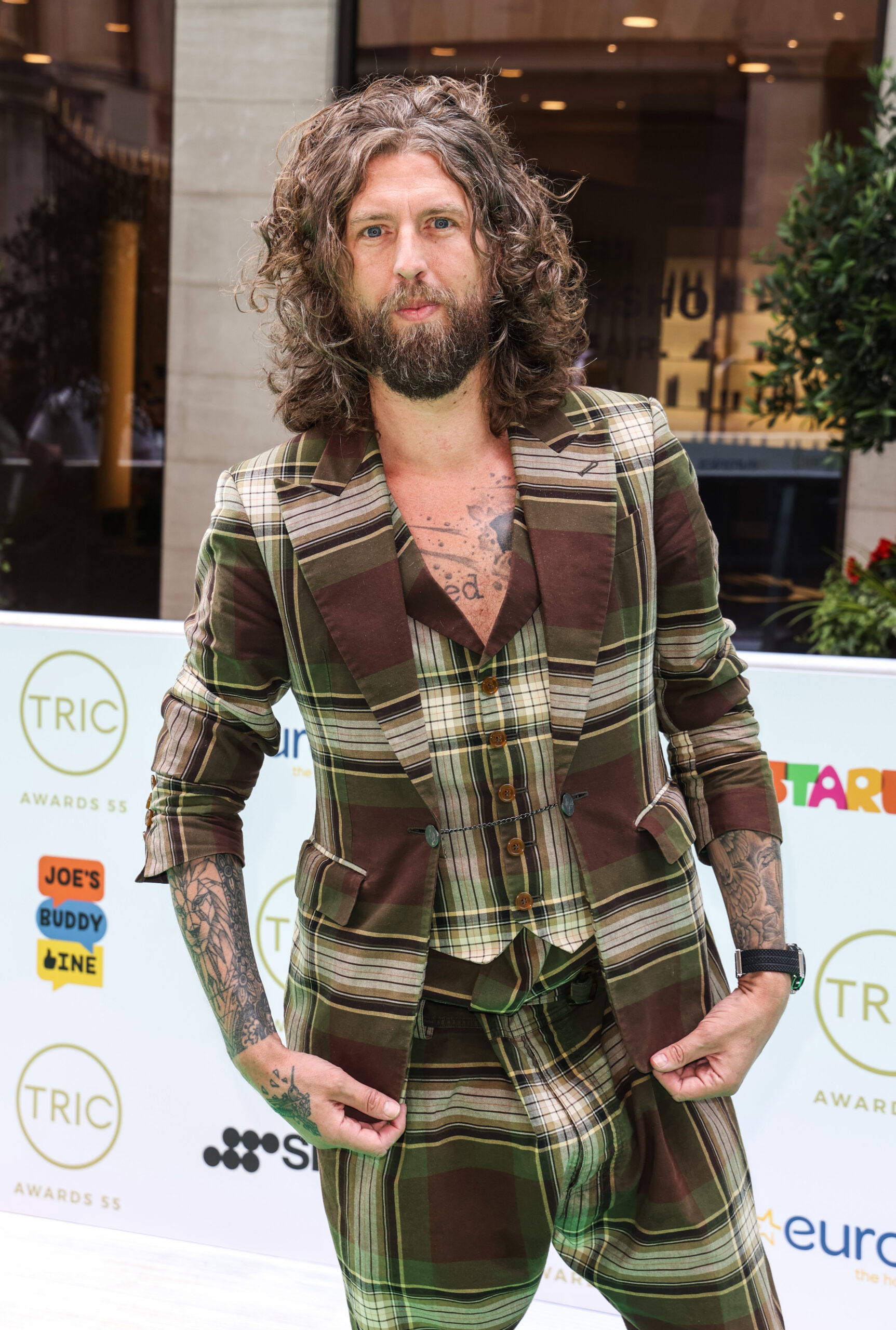 Jameson Stocks wearing a tartan suit