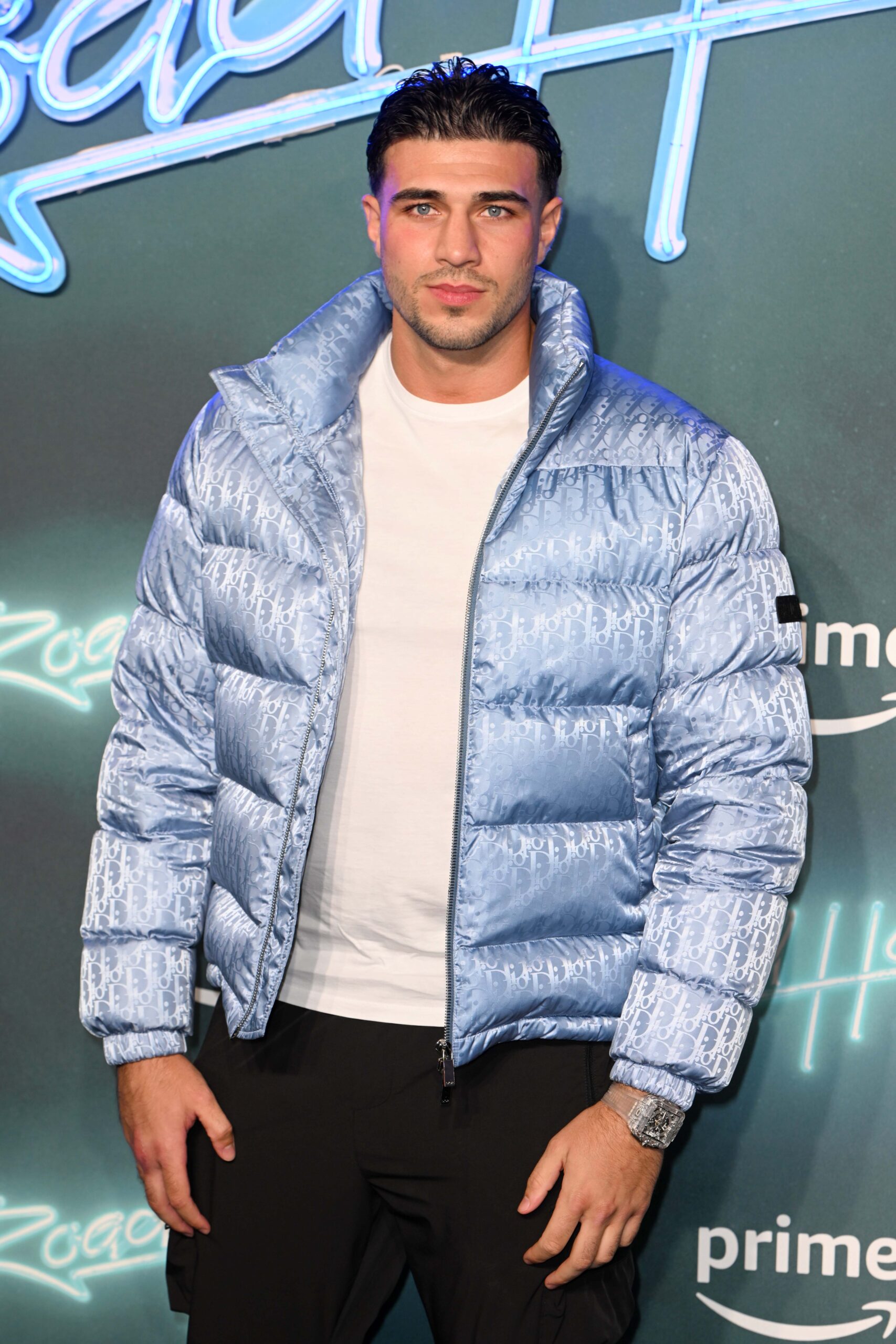 Tommy Fury in a puffy silver coat