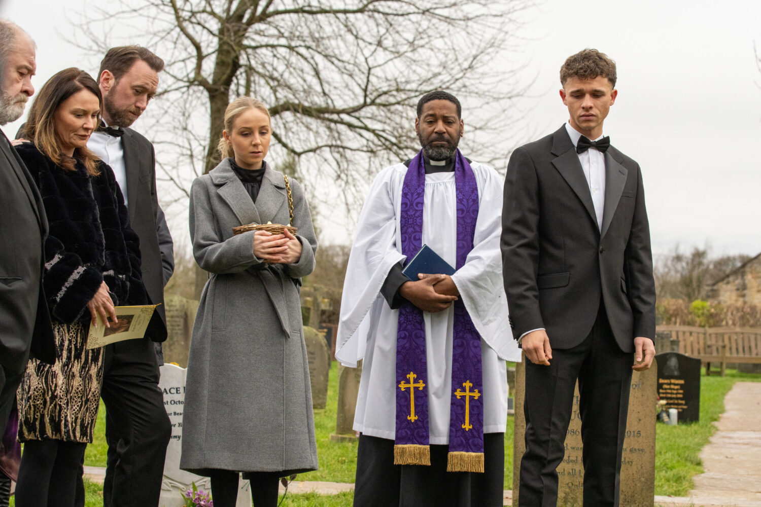 Jacob and others at Leyla's funeral