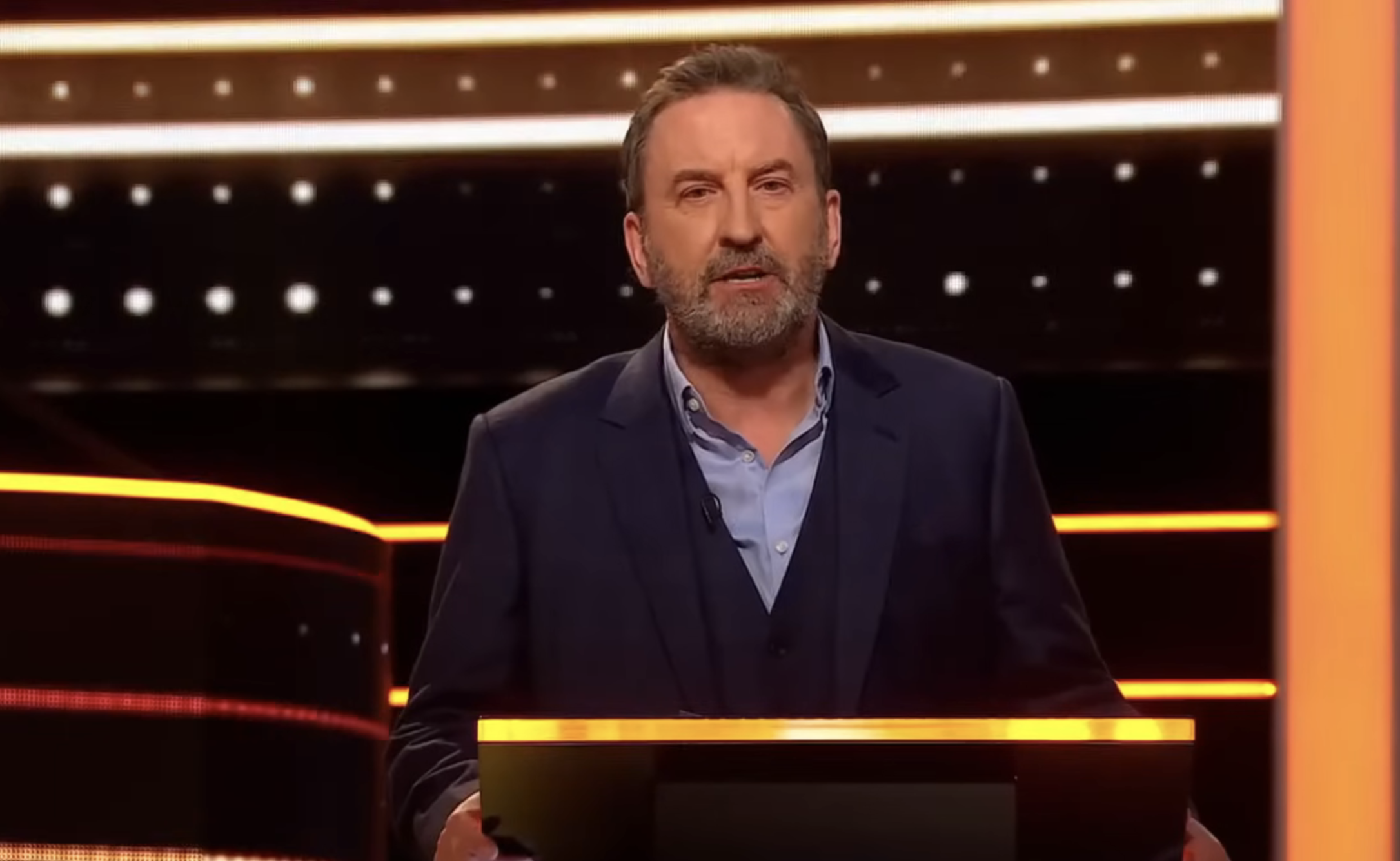 Lee Mack presenting The 1% Club