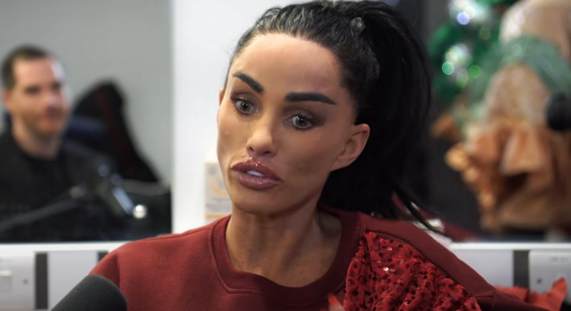 Katie Price looking down