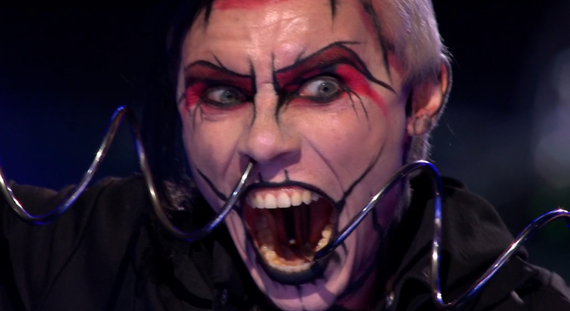 Auzy Blood with a metal rod through his nose and mouth on BGT