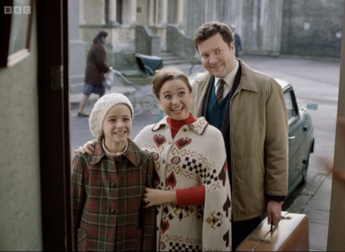 Colette and Nancy standing at door in Call The Midwife 