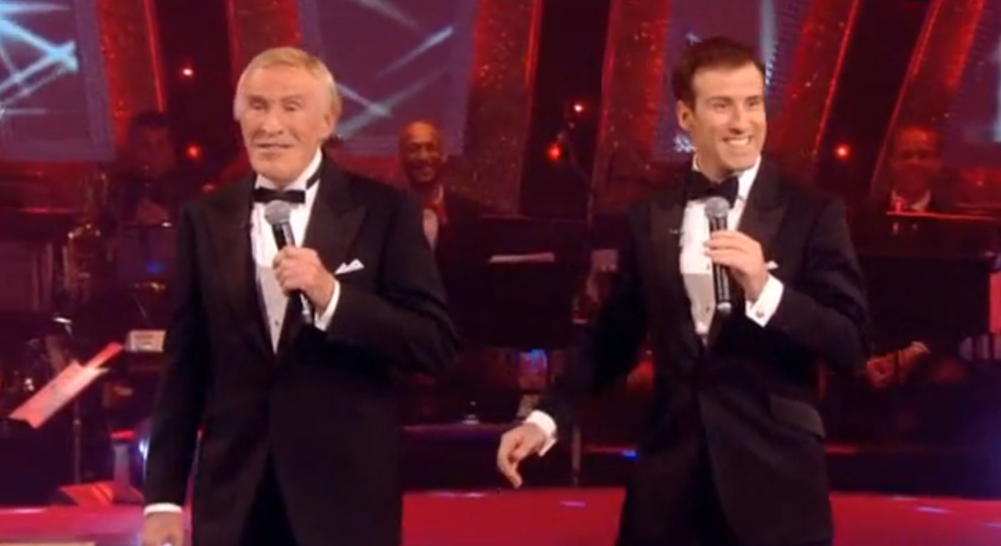 Anton and Bruce singing together on Strictly