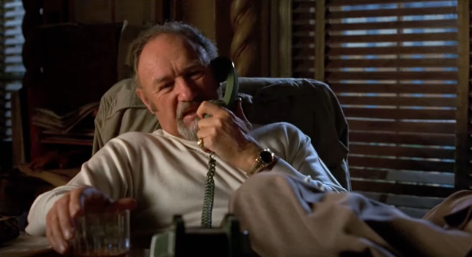 Gene Hackman wears a white shirt and speaks on the phone in Get Shorty (1995)