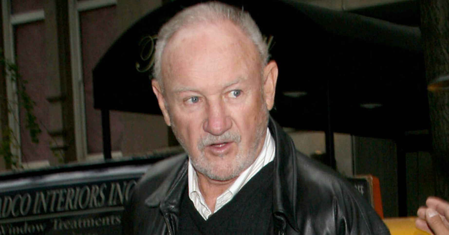 Gene Hackman wearing a leather jacket