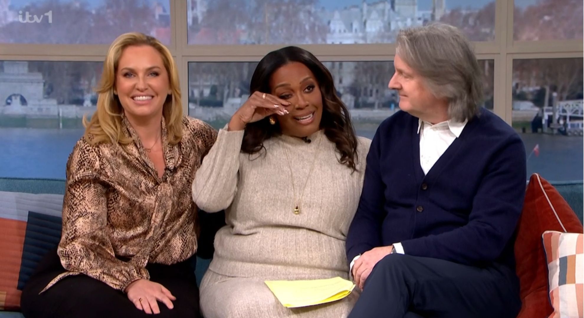 Josie Gibson smiling beside a sobbing Alison Gibson next to Martin Frizell