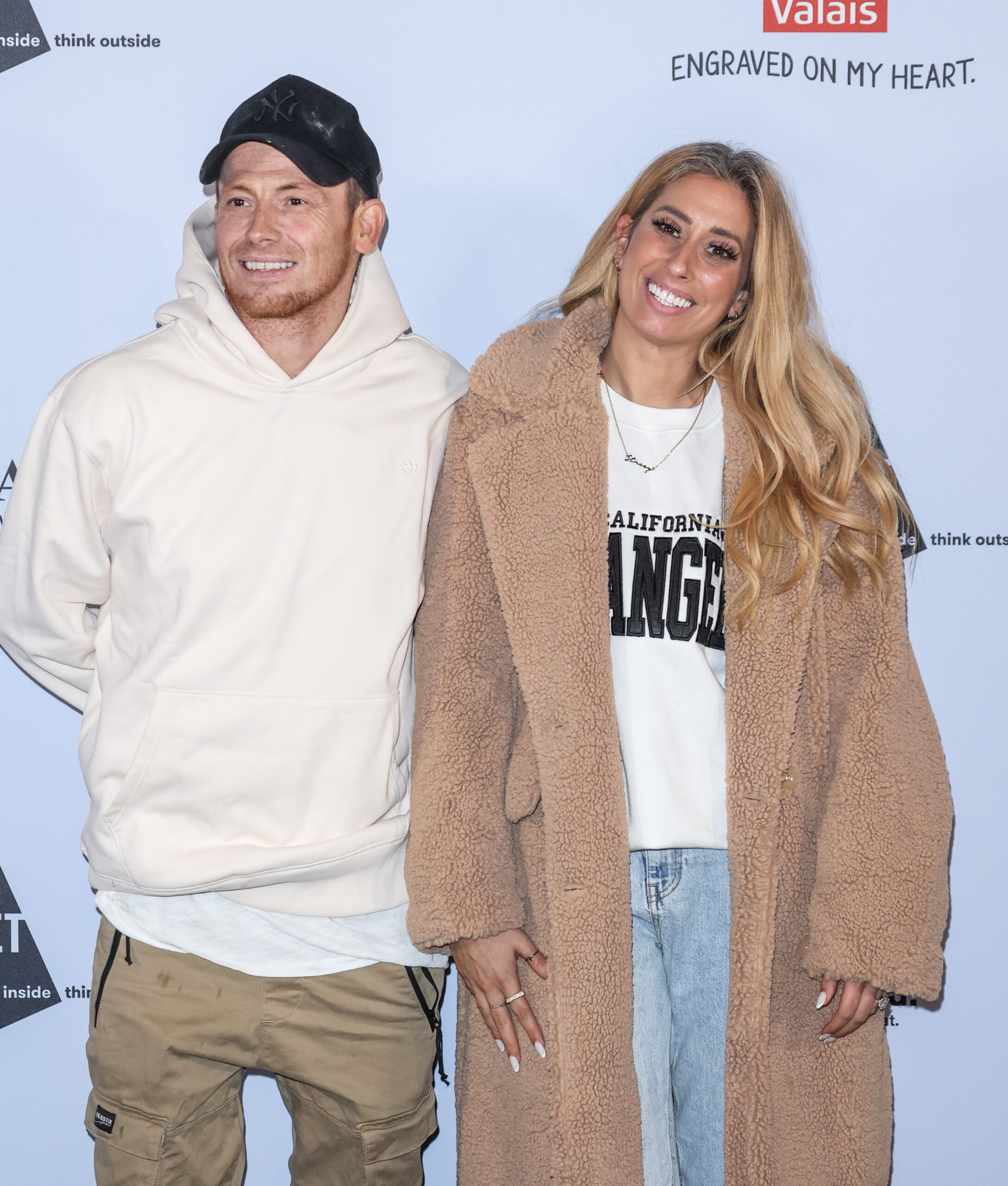 Stacey Solomon and Joe Swash smiling