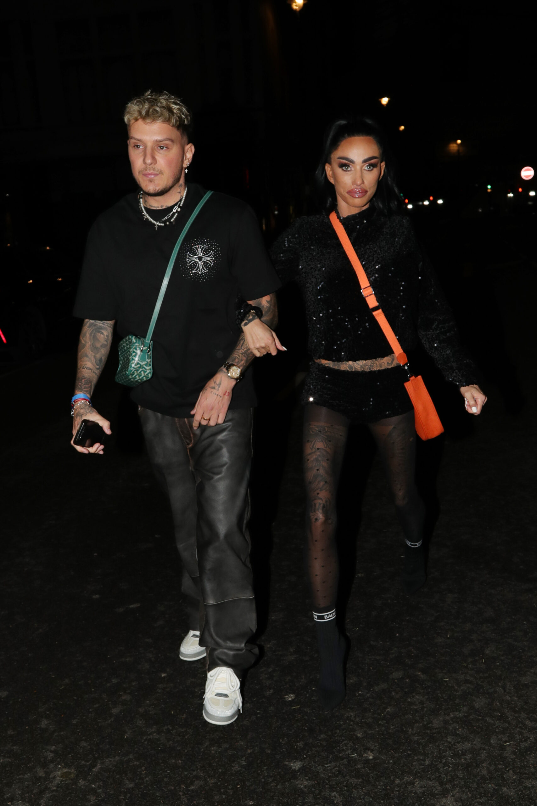 Katie Price and JJ Slater linking arms