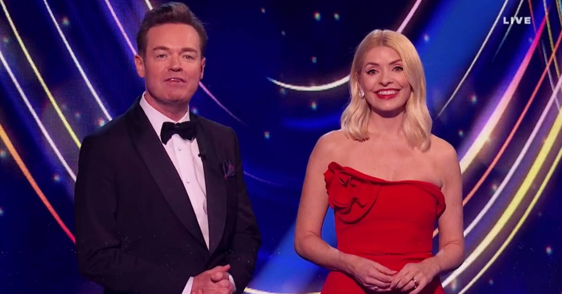 Dancing On Ice hosts Stephen Mulhern and Holly Willoughby face the camera