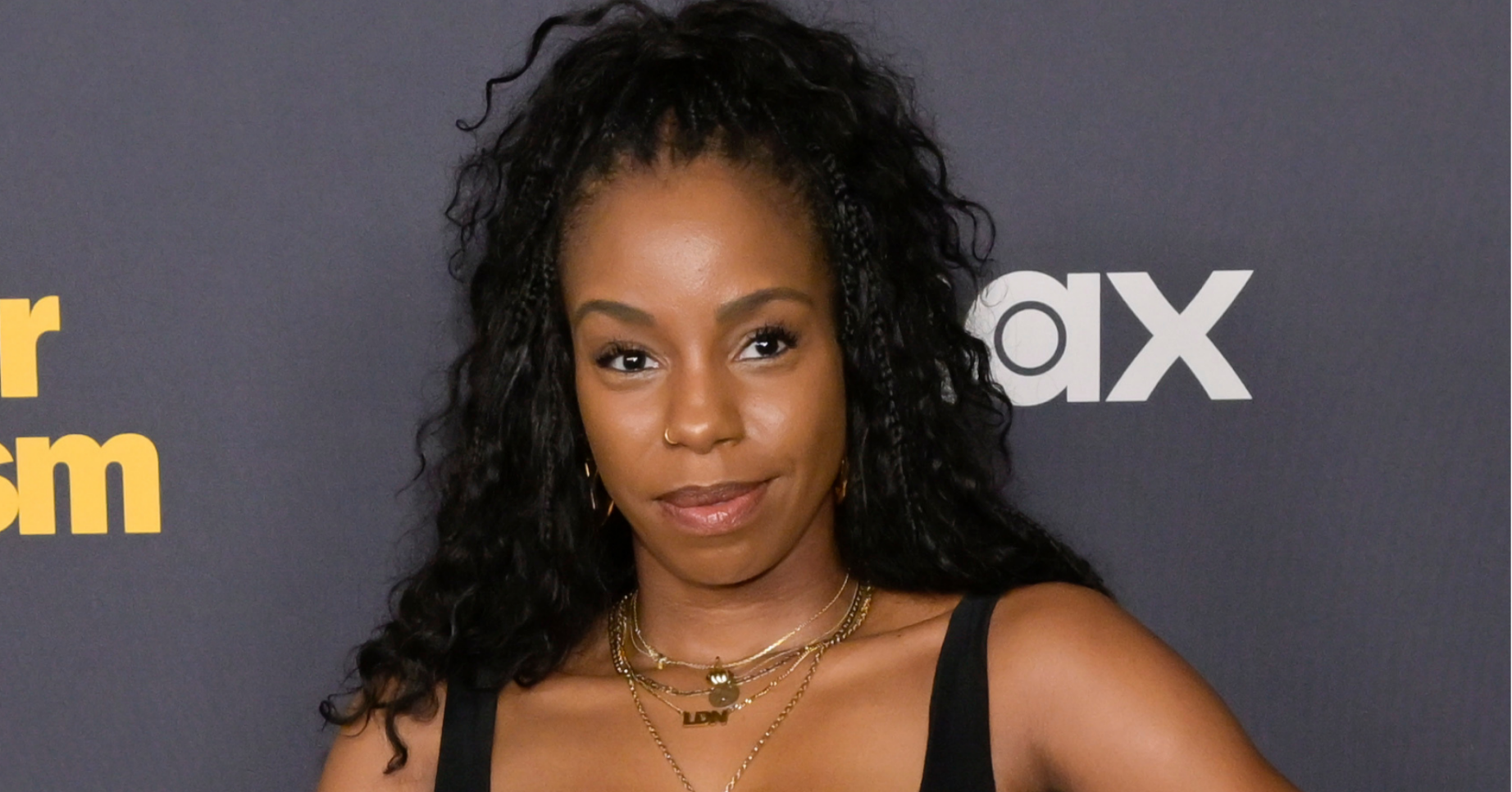 London Hughes posing on the red carpet