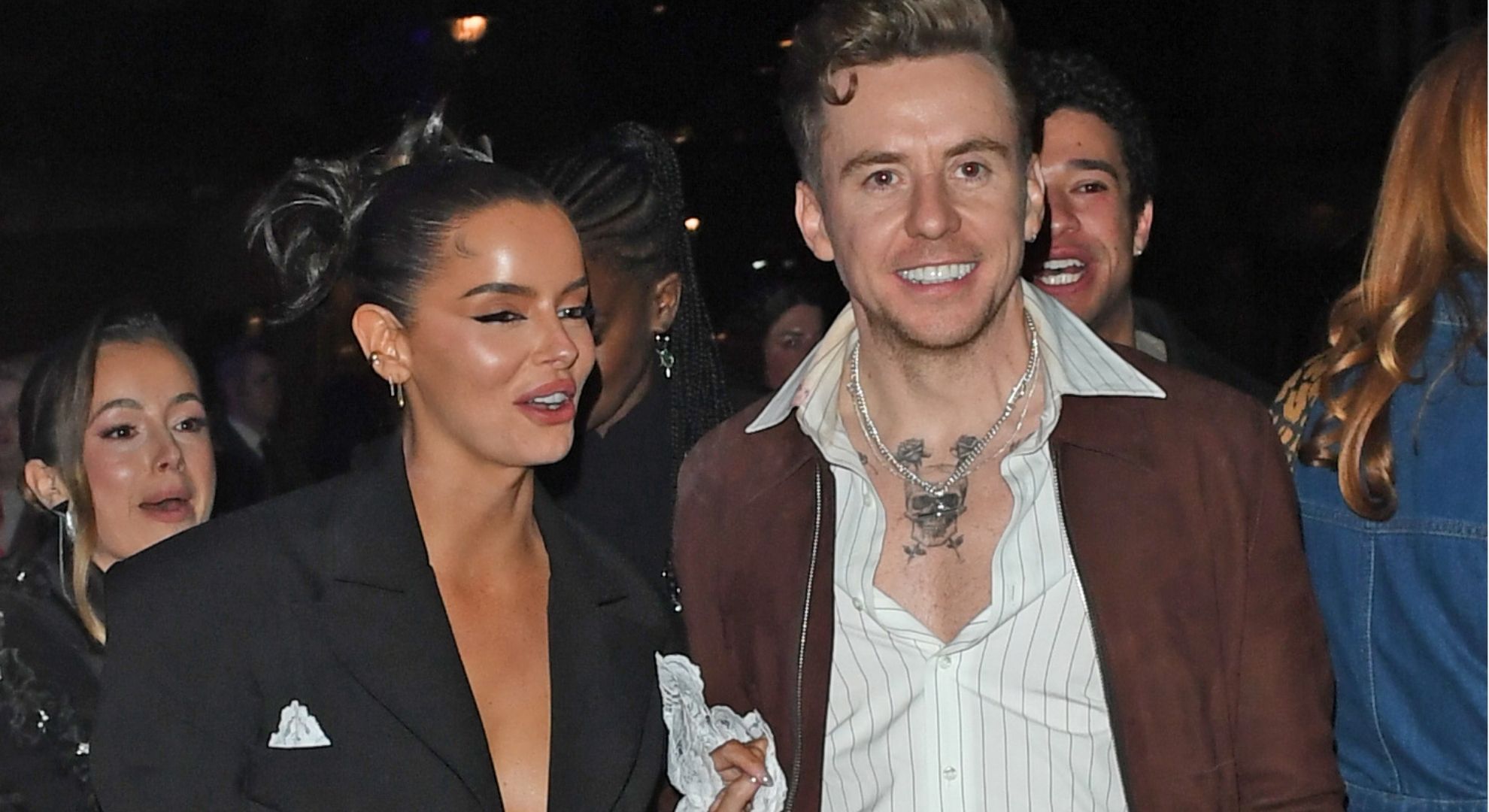 Maura Higgins and Danny Jones smiling at the BRITS