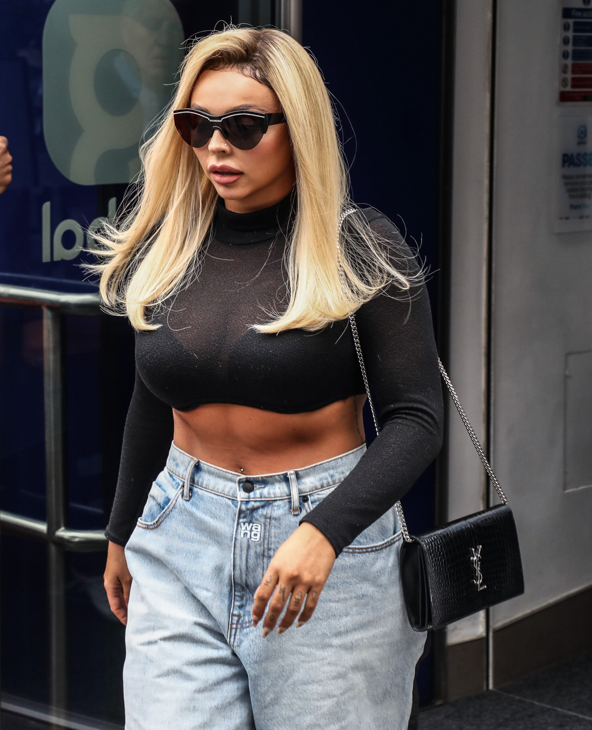 Jesy Nelson wearing sunglasses