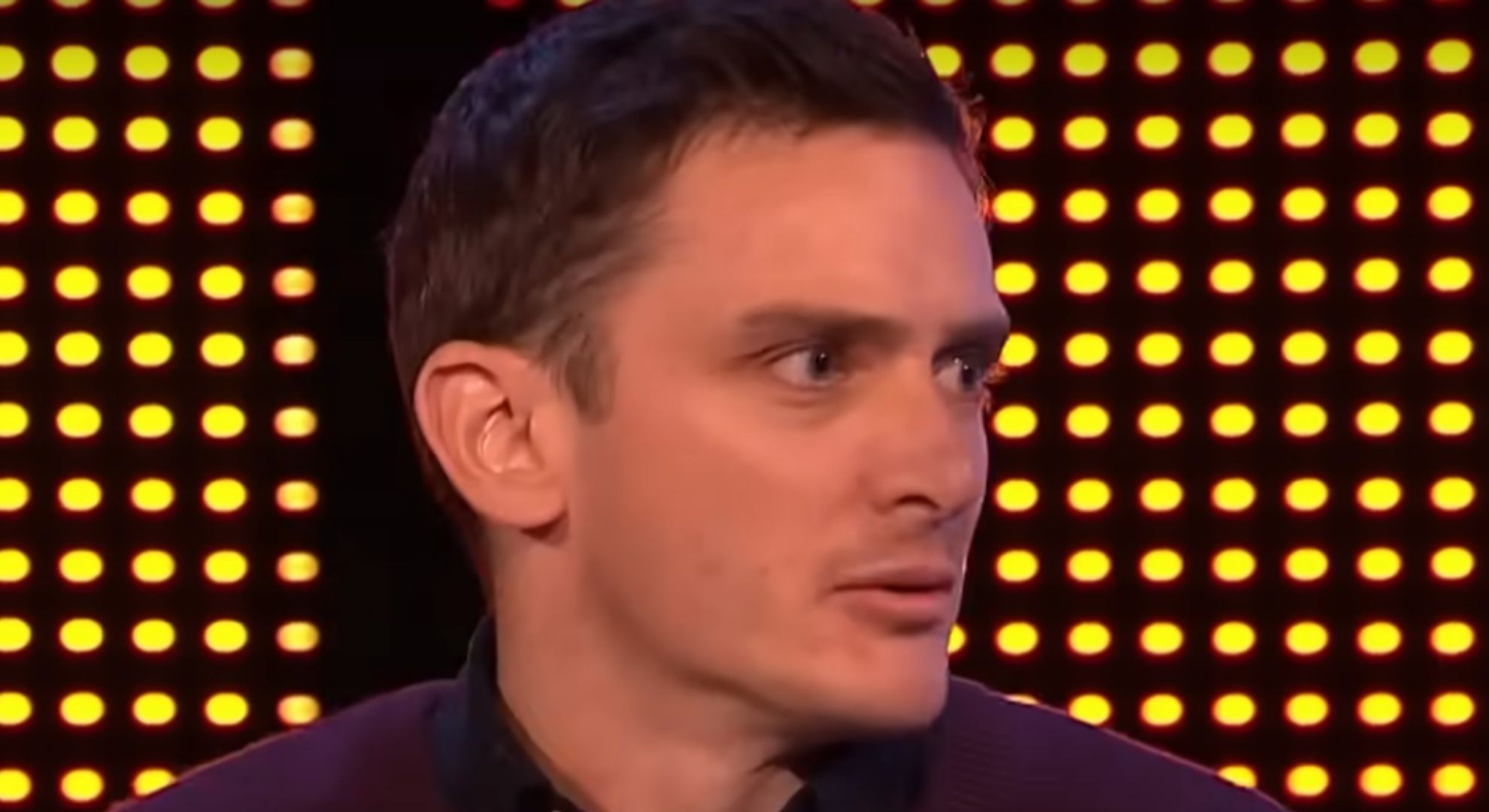 The Chase player Jacob looking left 