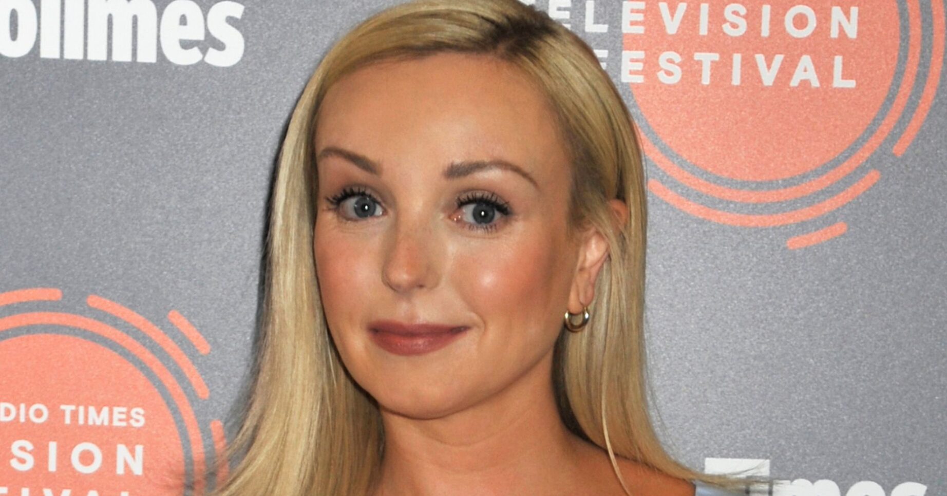 Helen George smiling