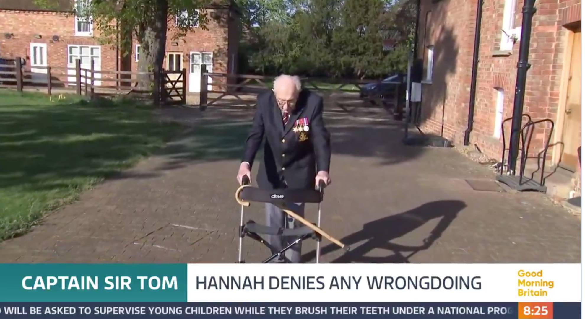 Captain Tom Moore walks during lockdown
