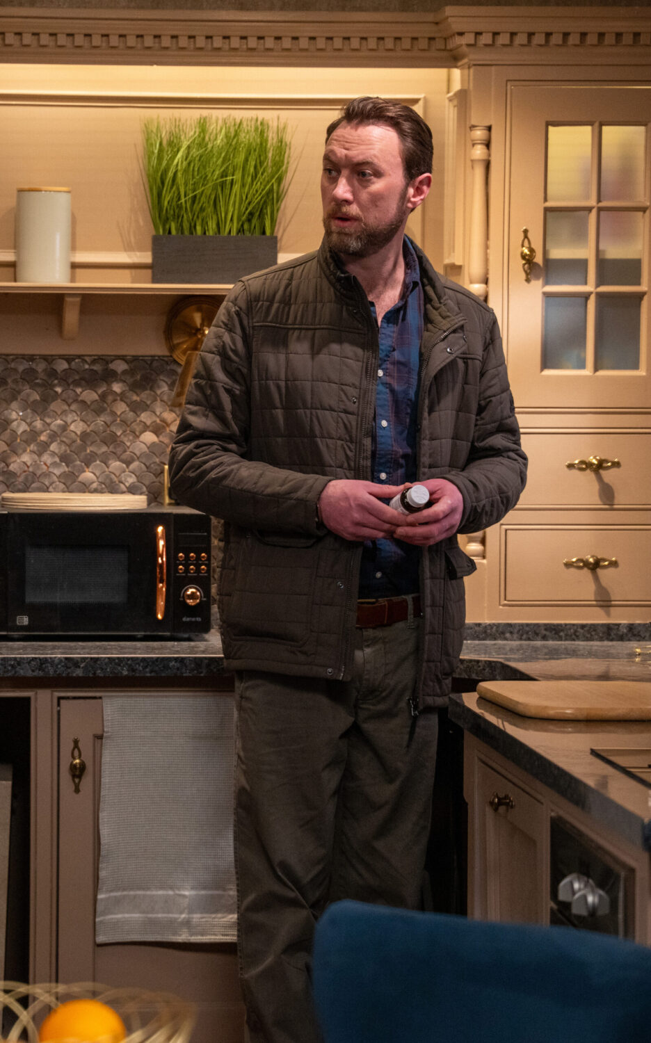 Liam holding bottle of pills in Emmerdale