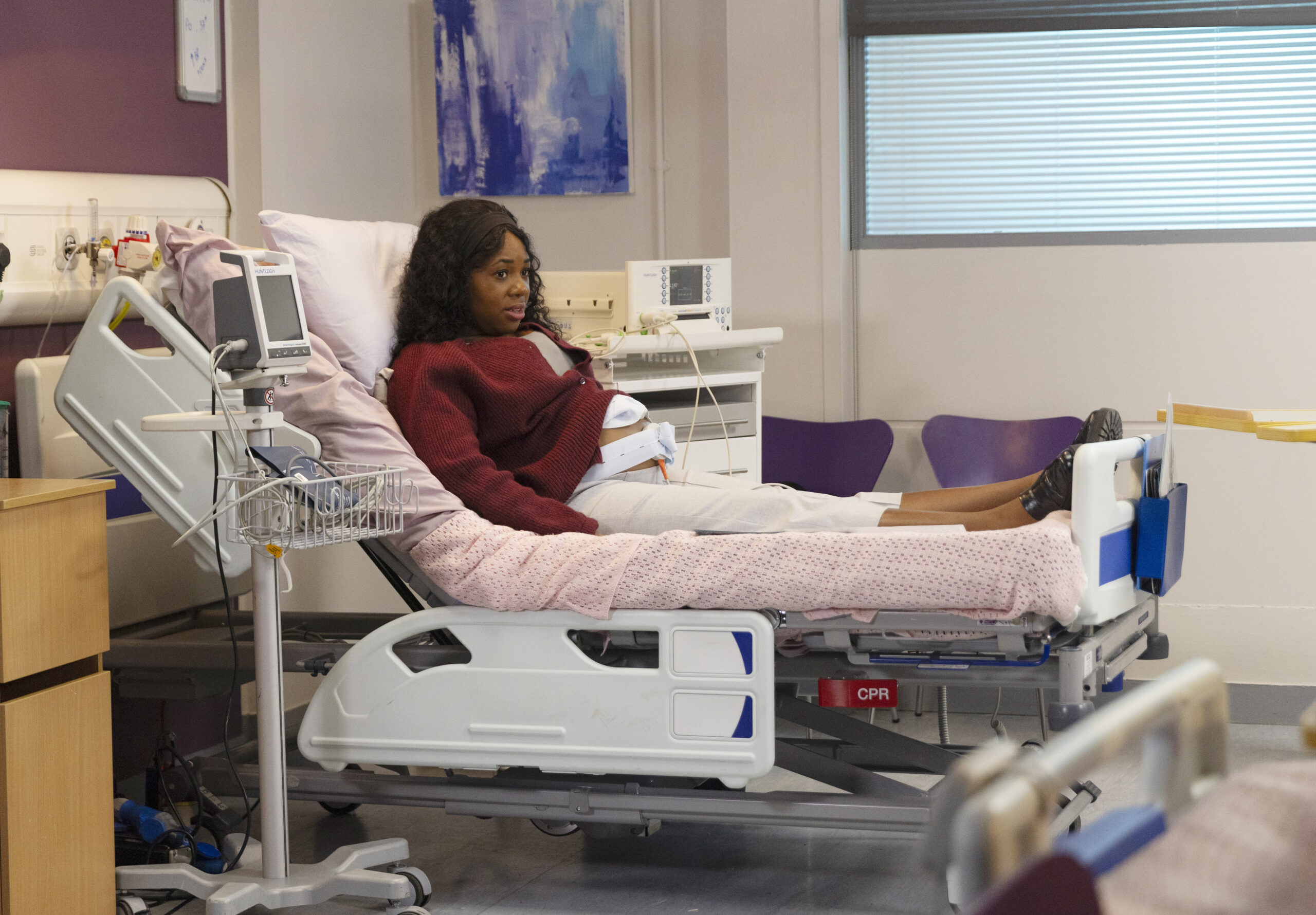 Dee-Dee in a hospital bed on Corrie