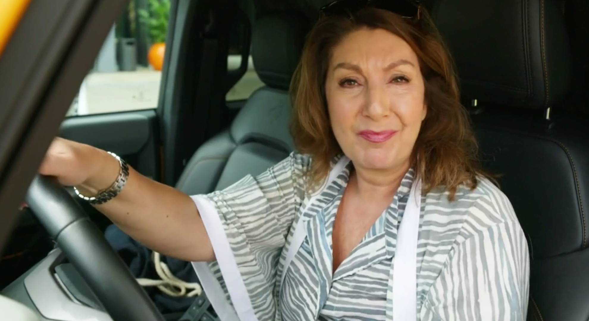 Jane McDonald behind the steering wheel