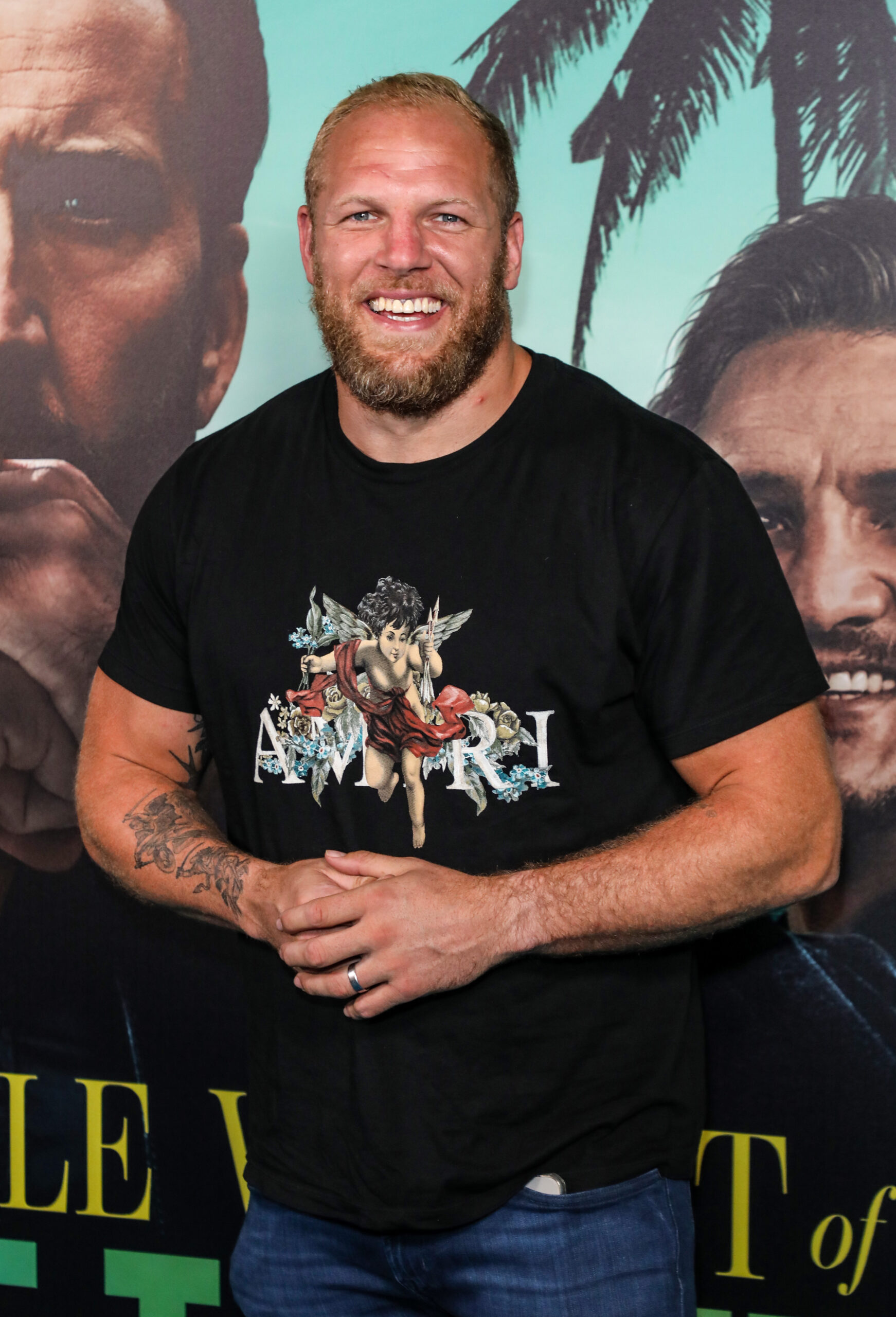 James Haskell smiling in a black T-shirt