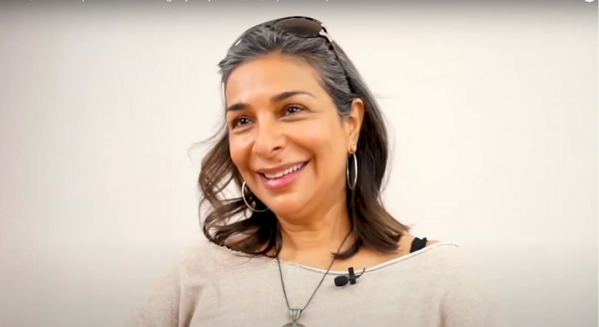 Shobna Gulati smiling in an interview