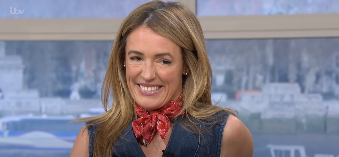 Cat Deeley smiling on This Morning with neck tie 