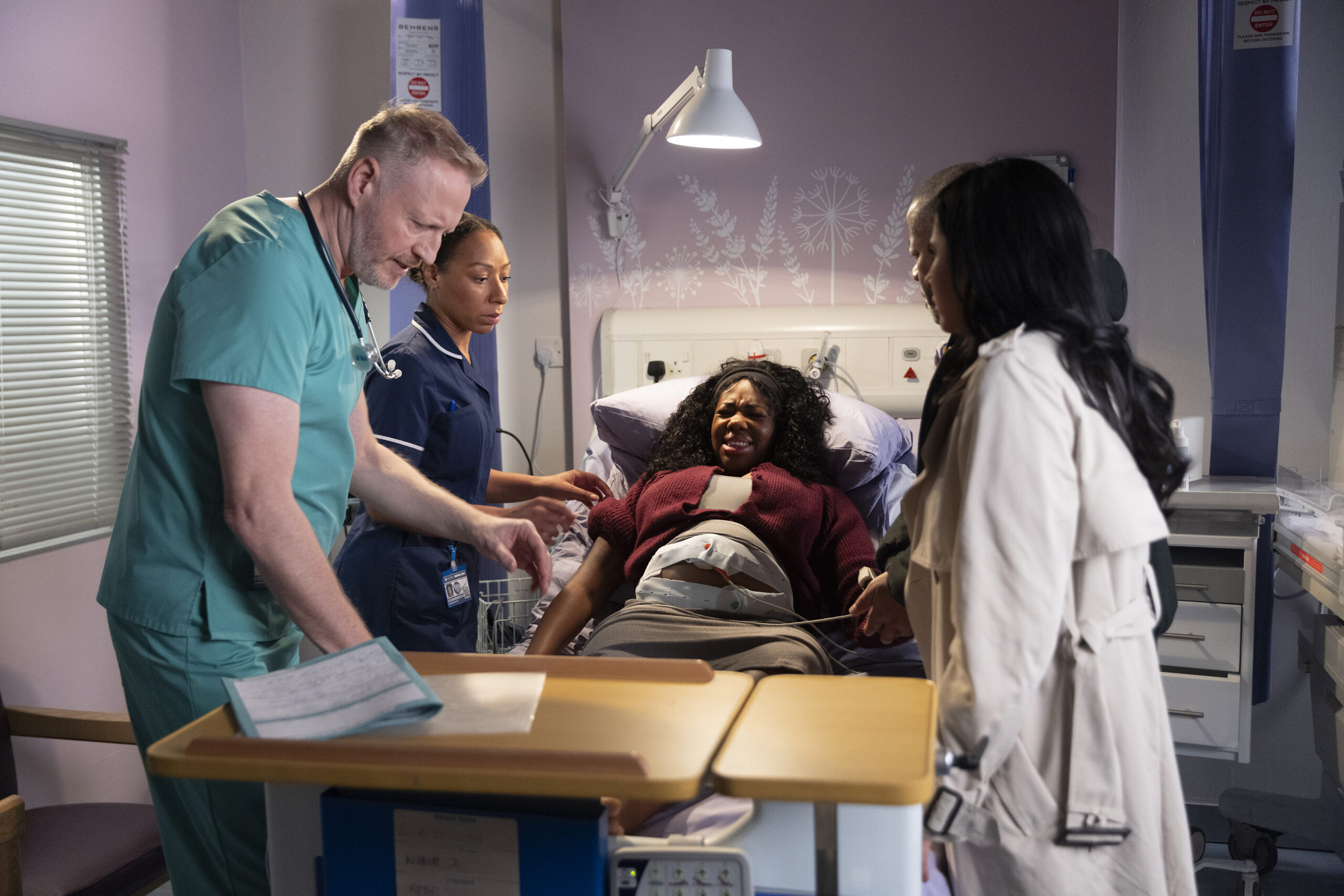 Dee-Dee is in pain as she gives birth surrounded by doctors 