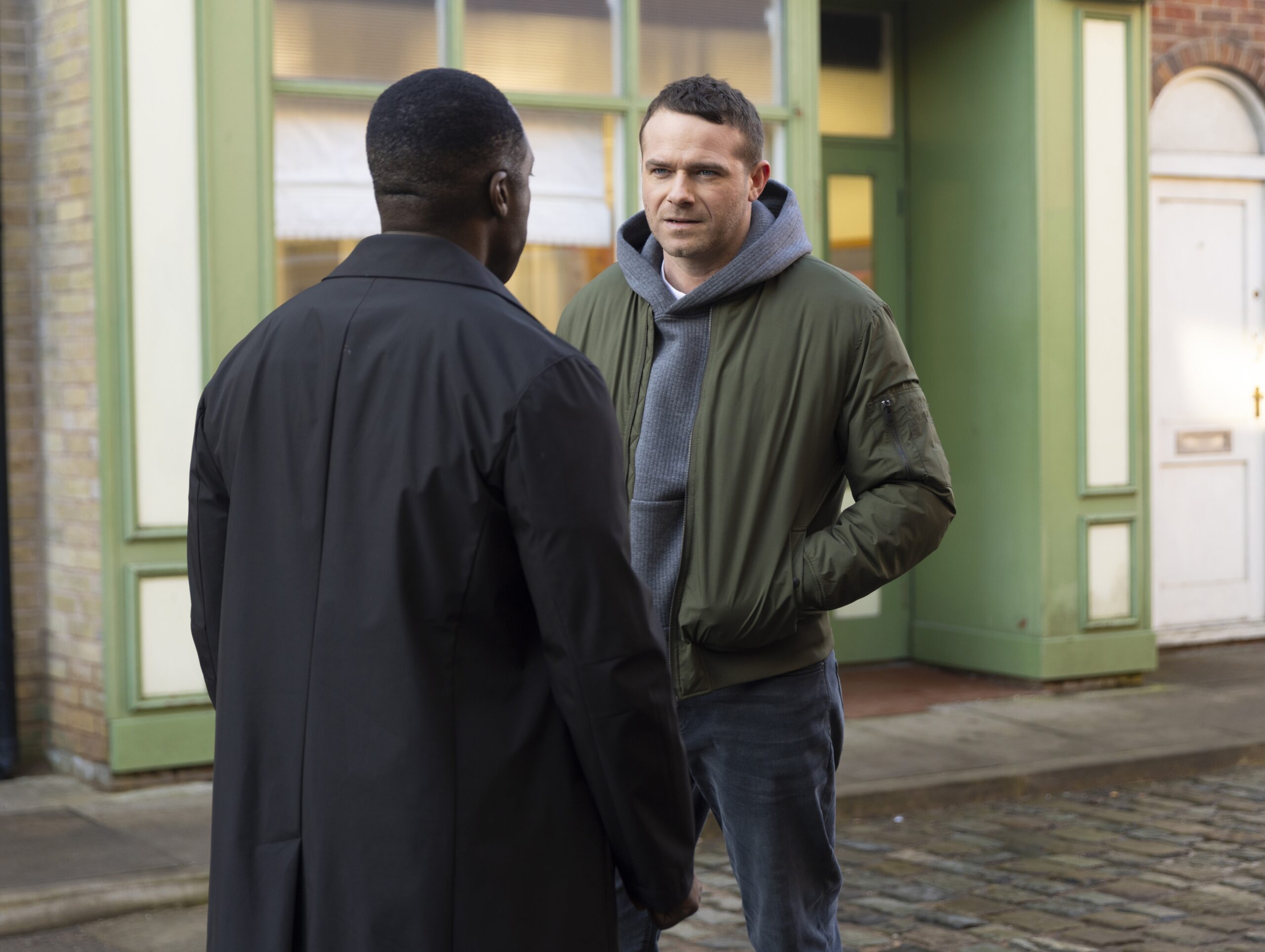 Coronation Street's Mick talking to Ronnie outside