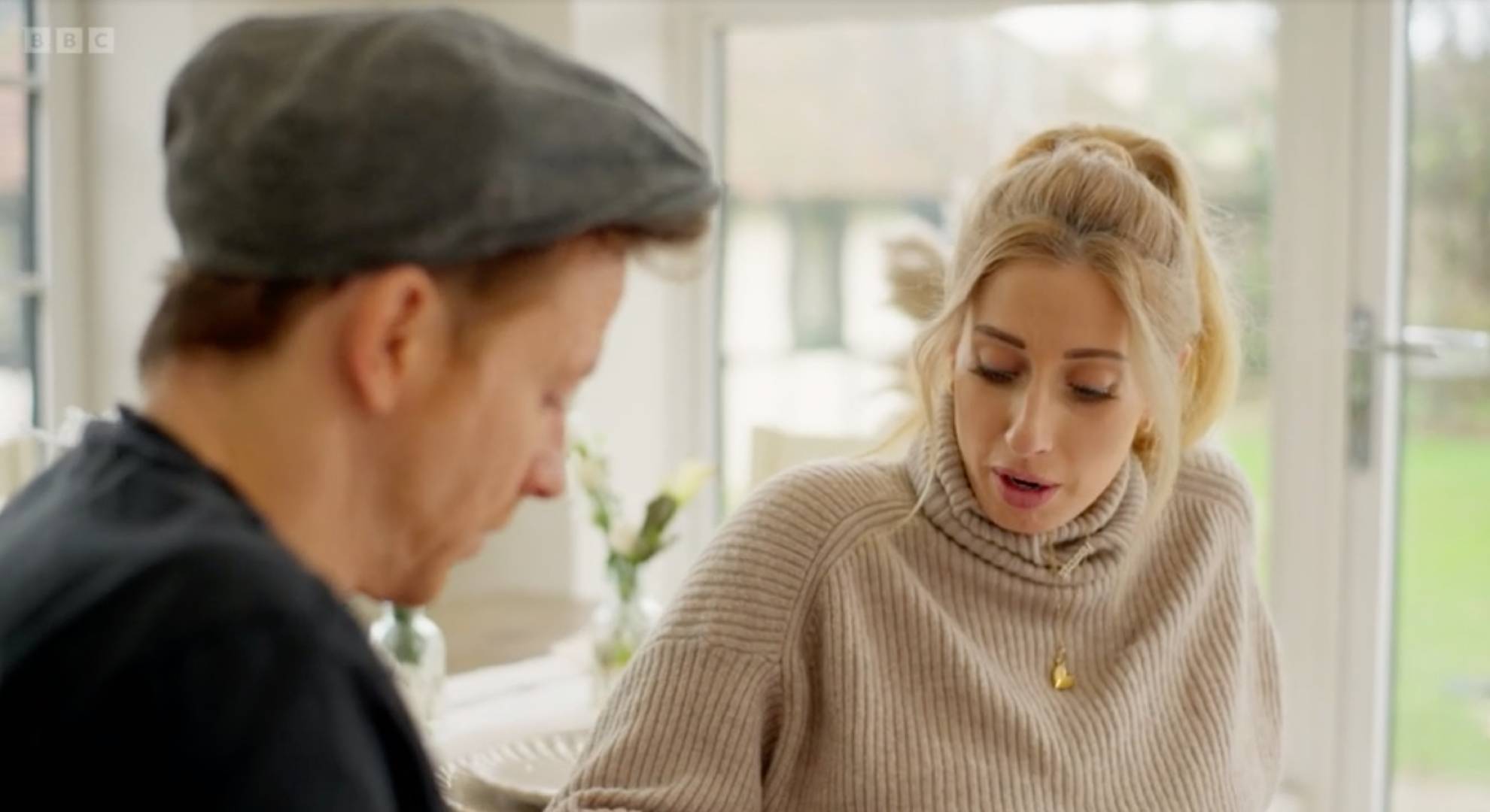 Stacey Solomon and Joe Swash both look downwards