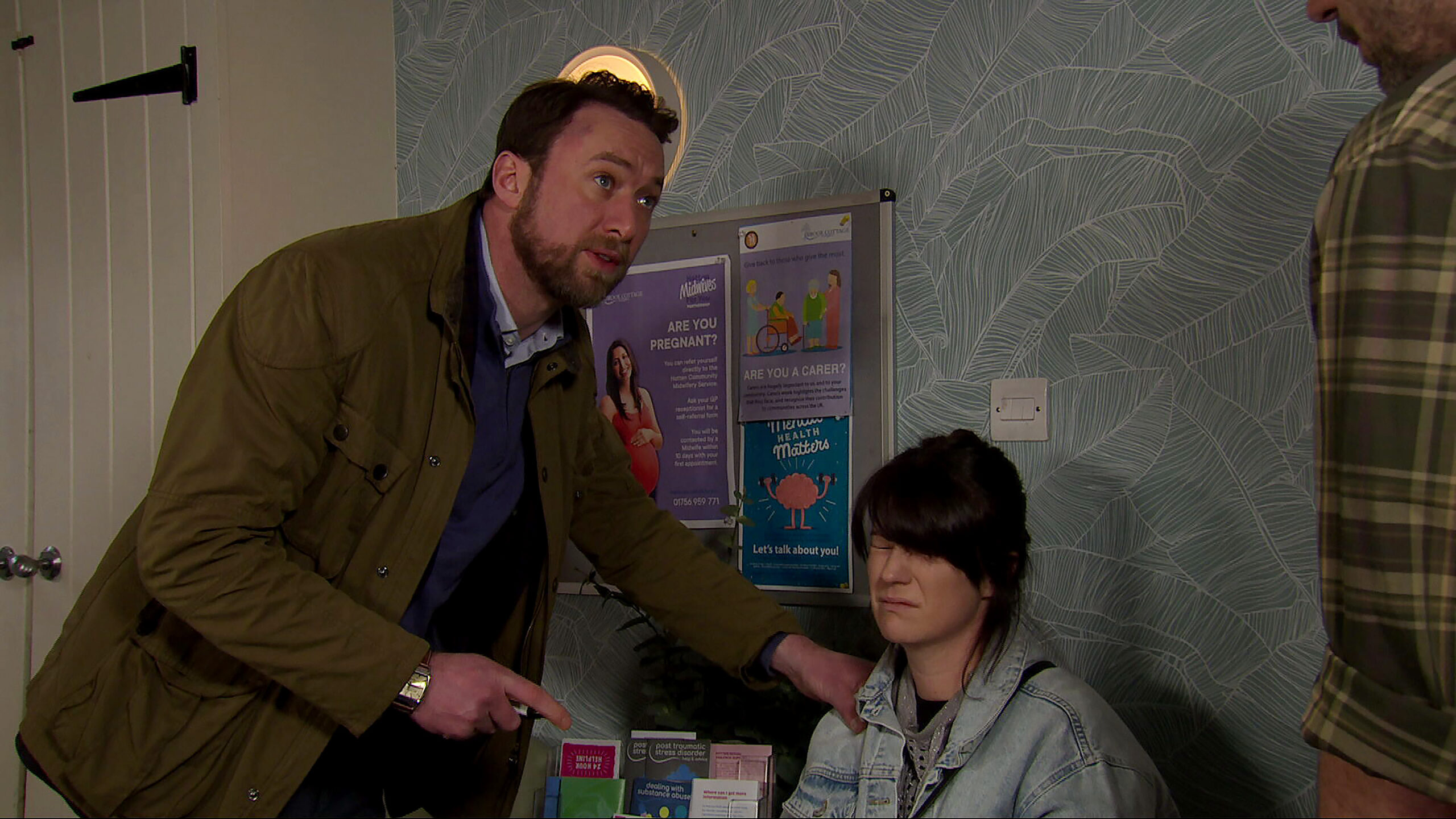 Liam tending to Kerry at the surgery