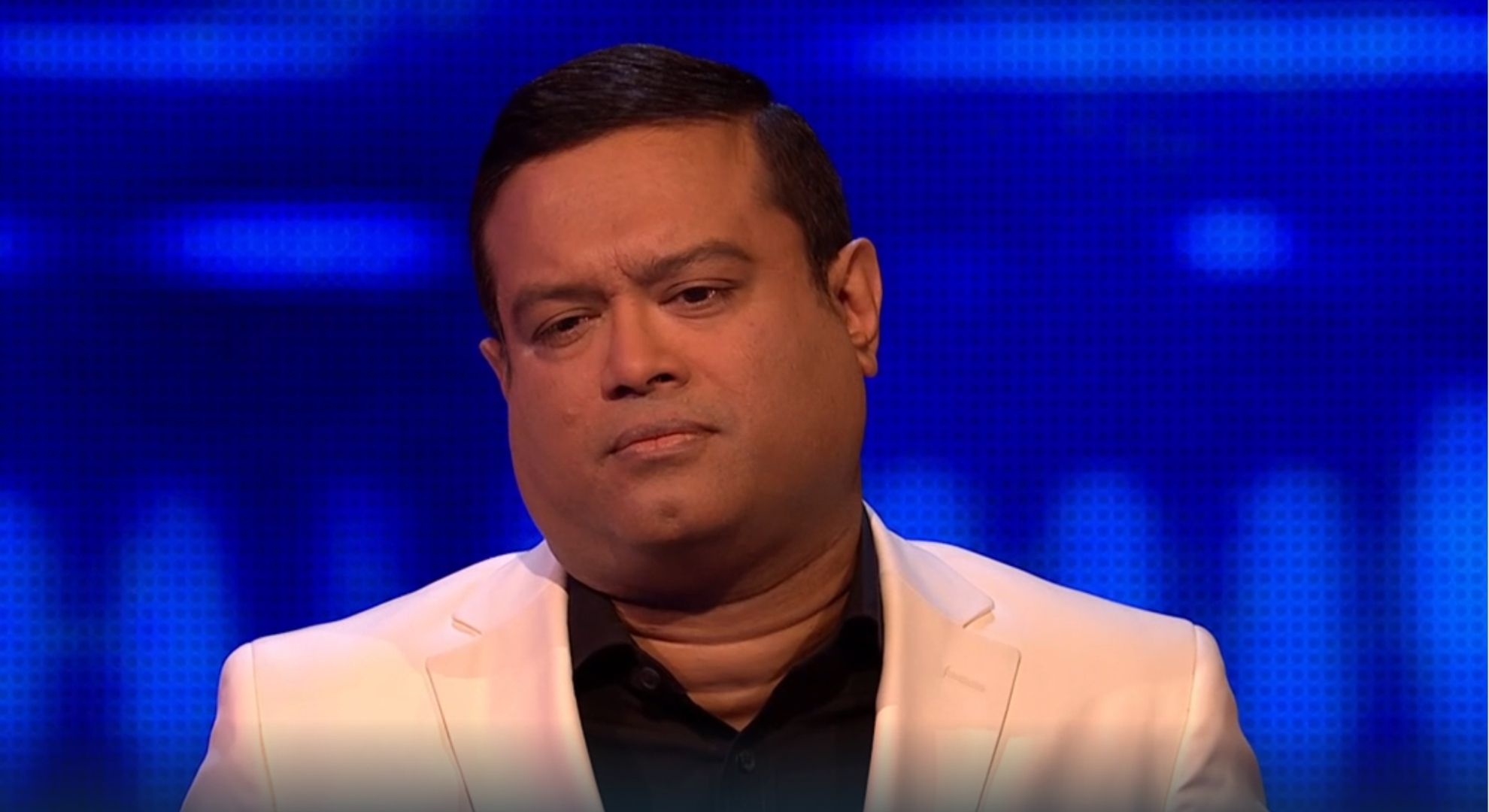 Paul Sinha looking cross on The Chase