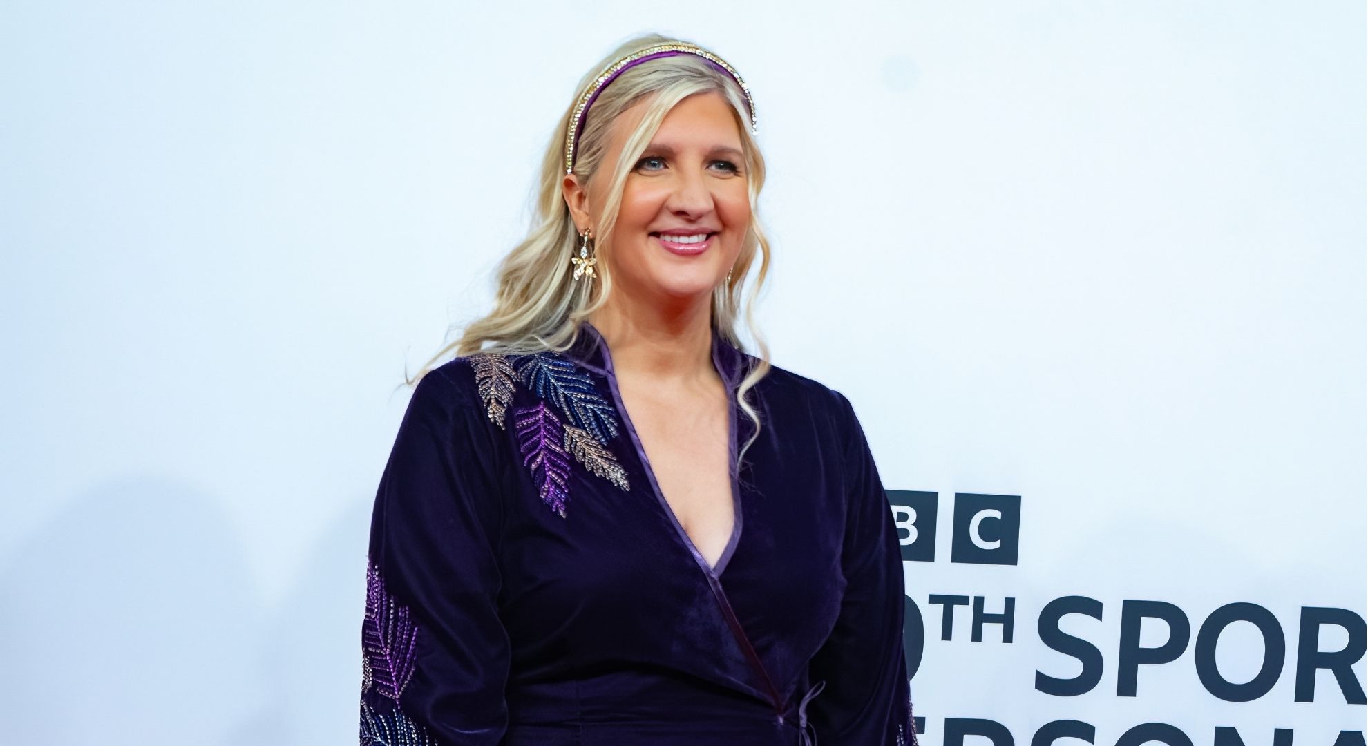 Rebecca Adlington wearing a dress smiling