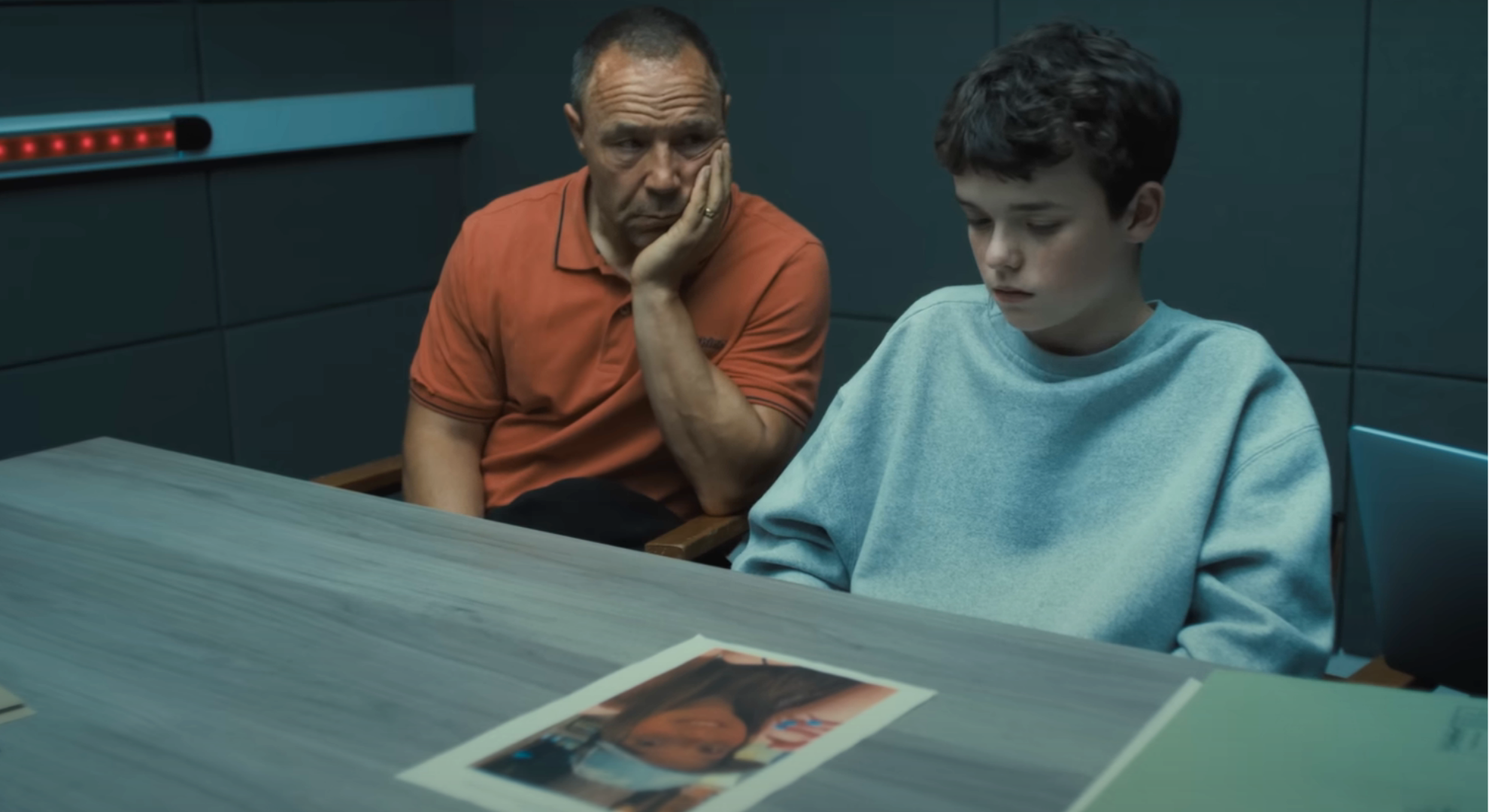 Screenshot from Adolescence depicting Stephen Graham and Owen Cooper 