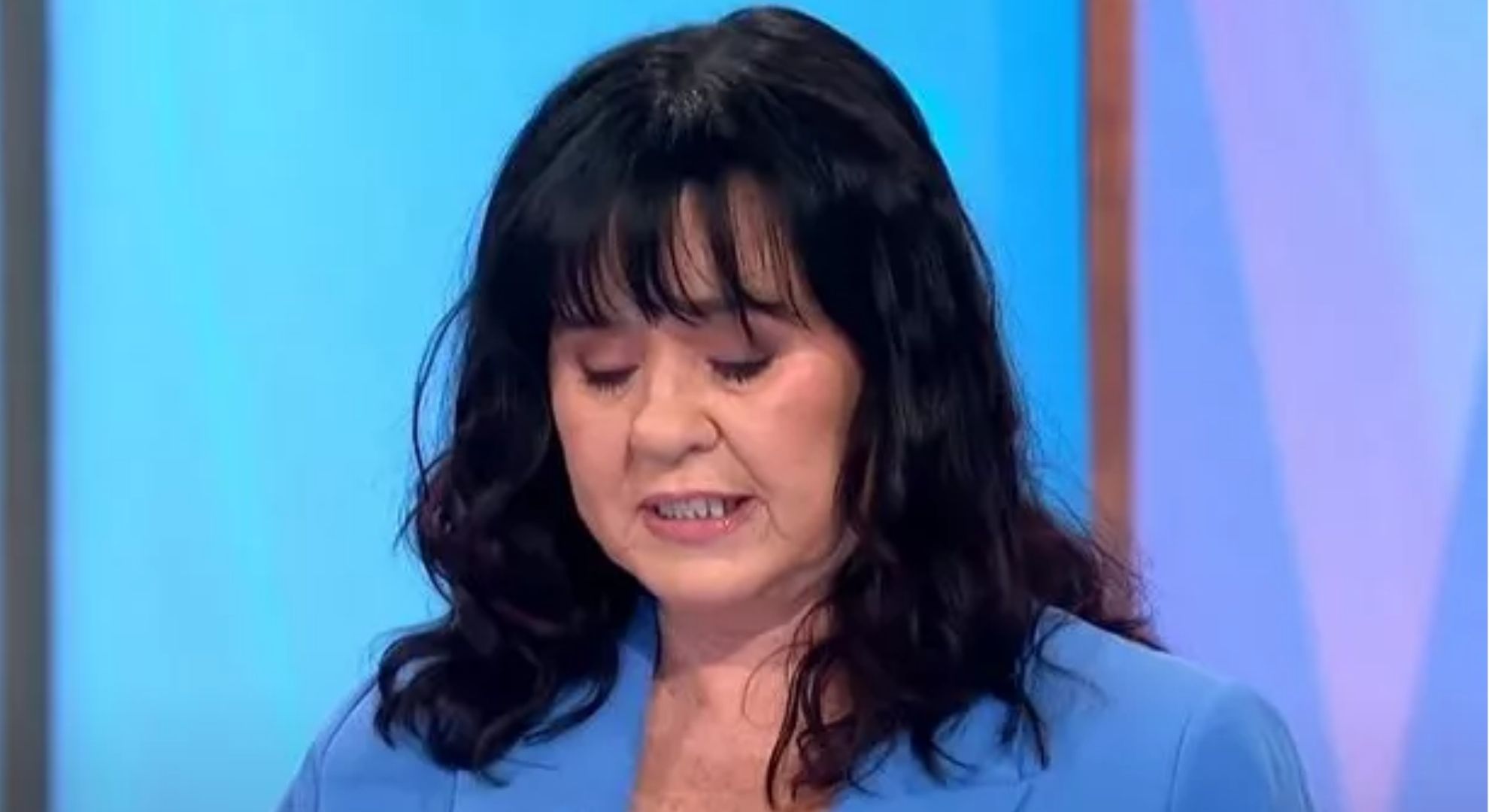 Coleen Nolan looking down