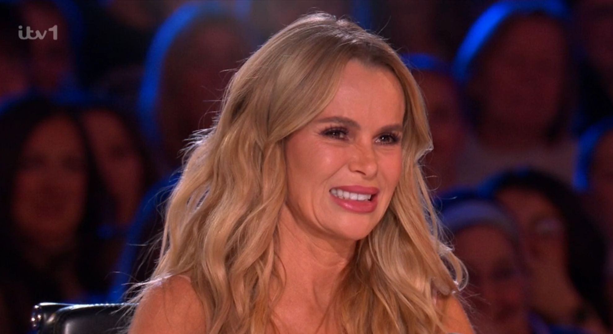 Amanda Holden wincing