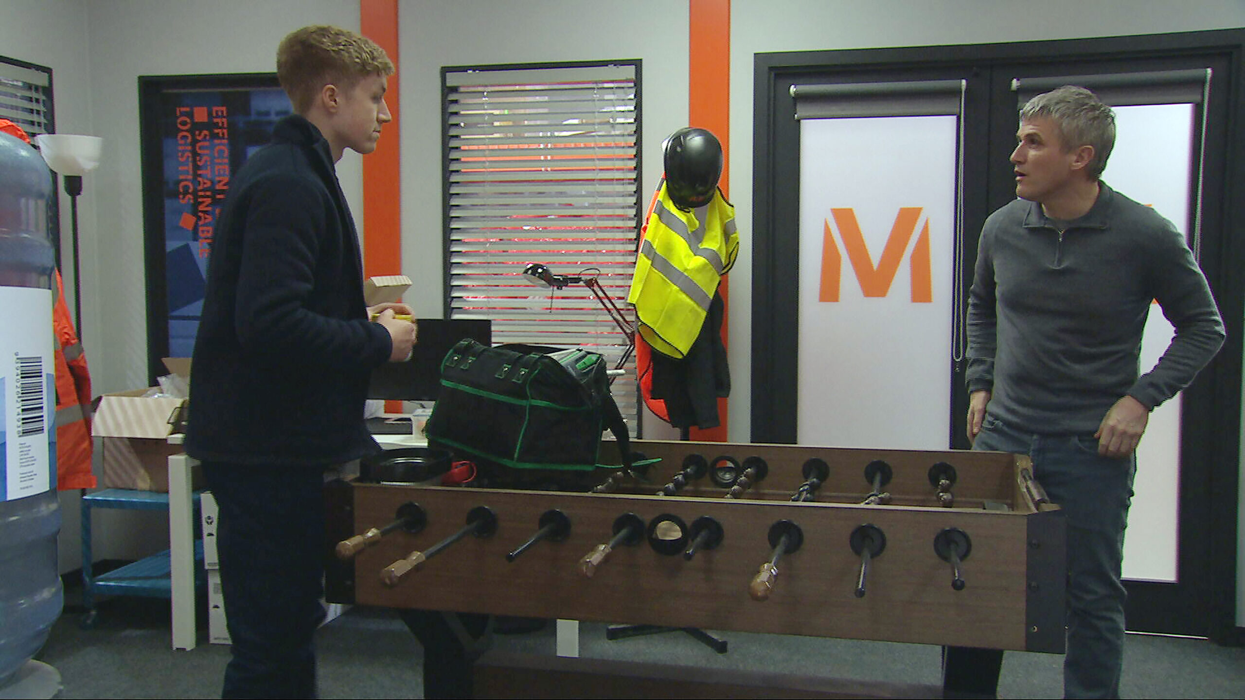 Noah and Caleb talking in the Depot