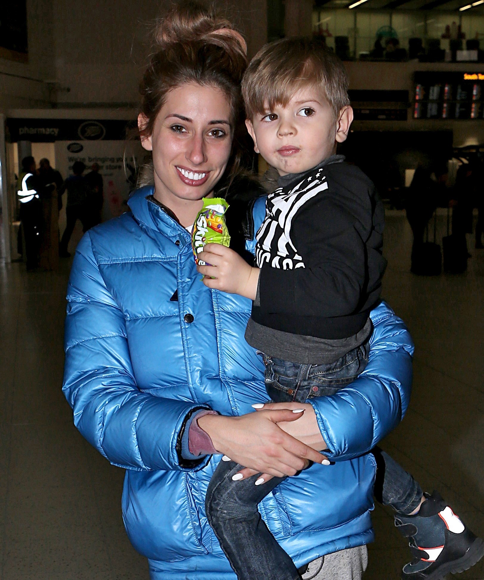 Stacey Solomon holding baby Leighton 