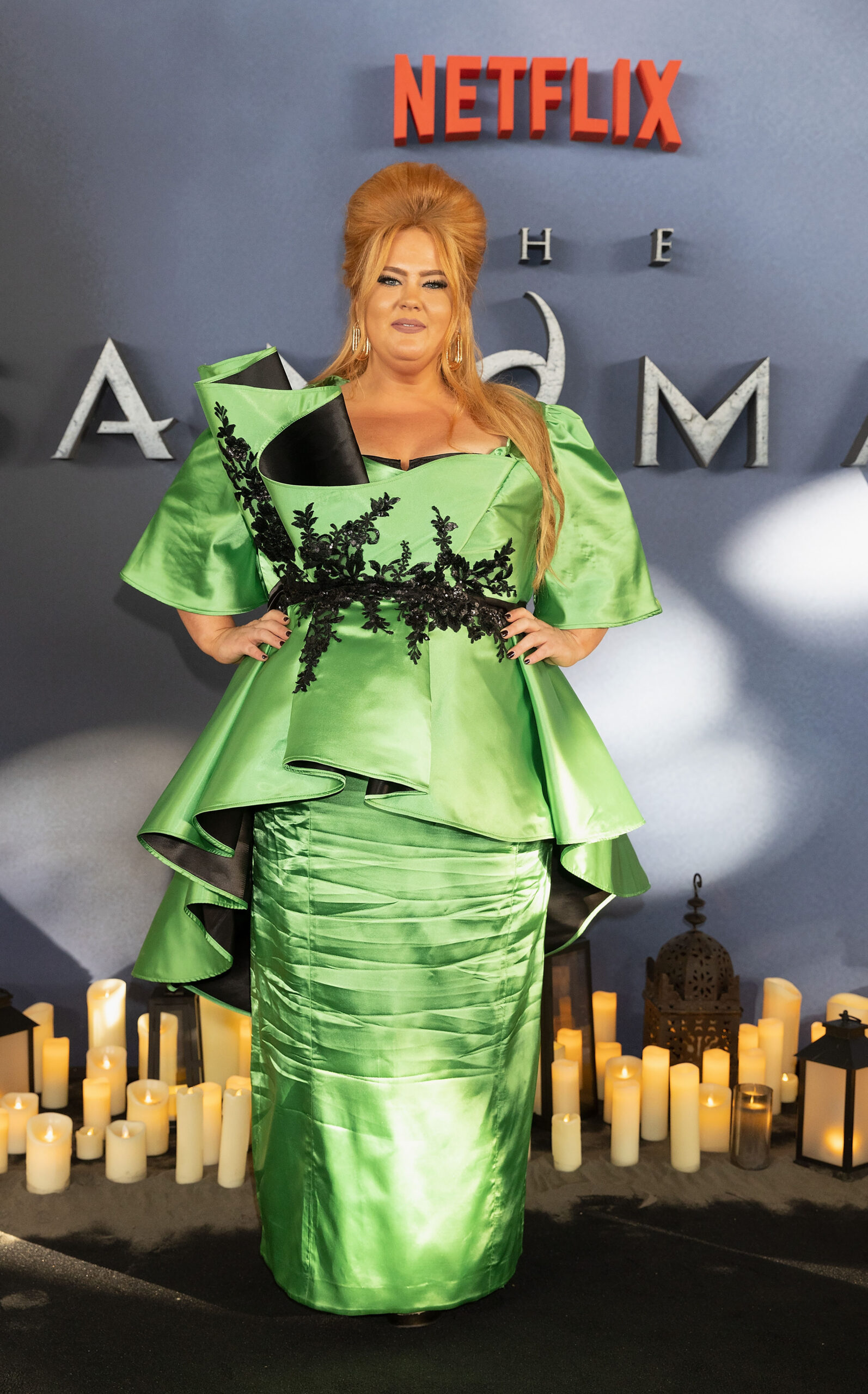 Donna Preston wearing a green dress on the red carpet 