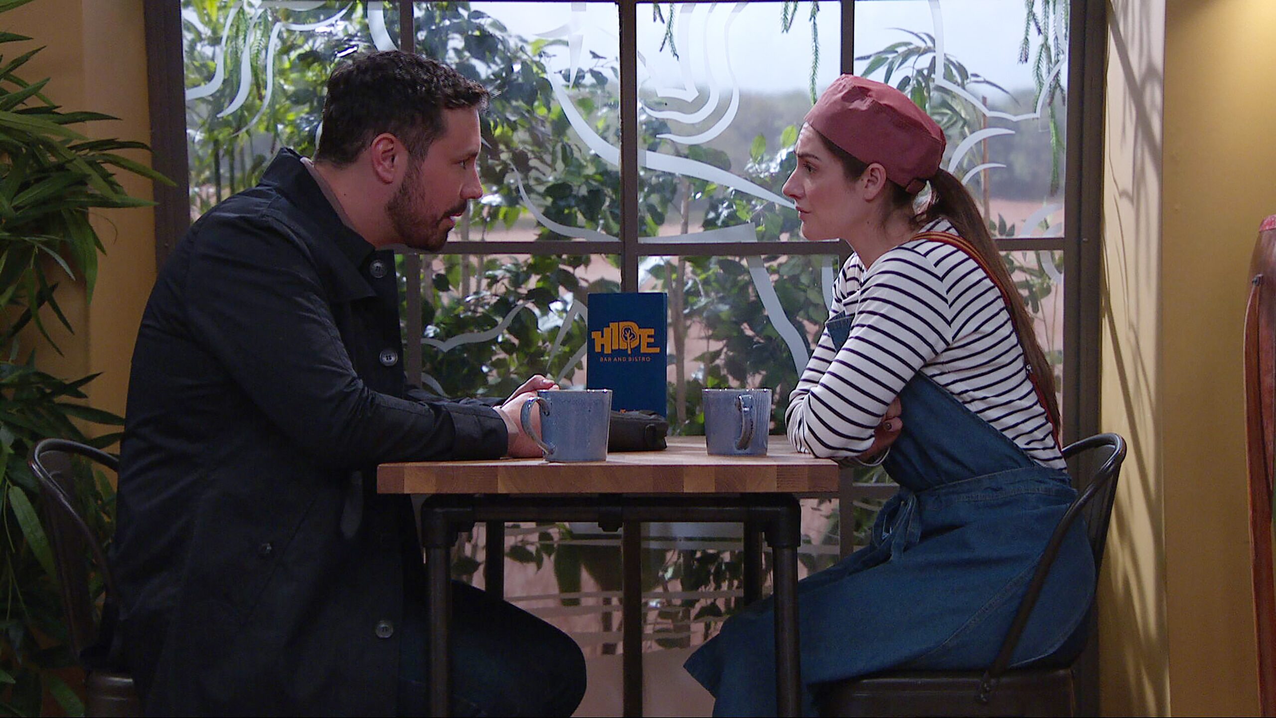 Victoria talking to John's mate in The Hide