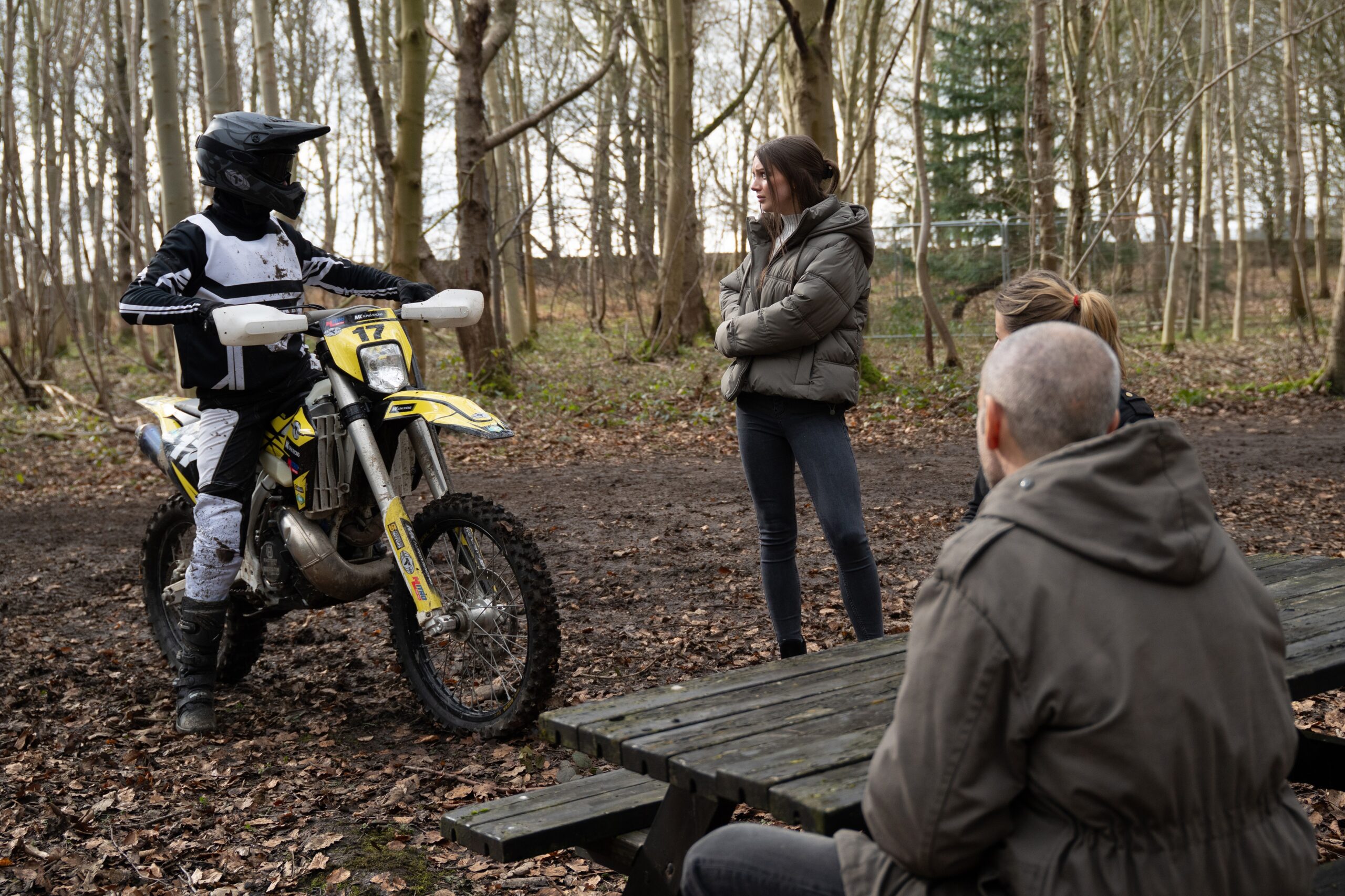 Sarah staring at Kammy on bike