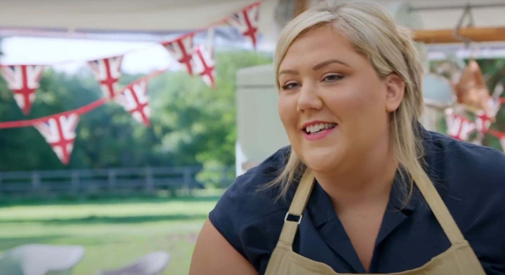 Laura Adlington smiling on Bake Off 