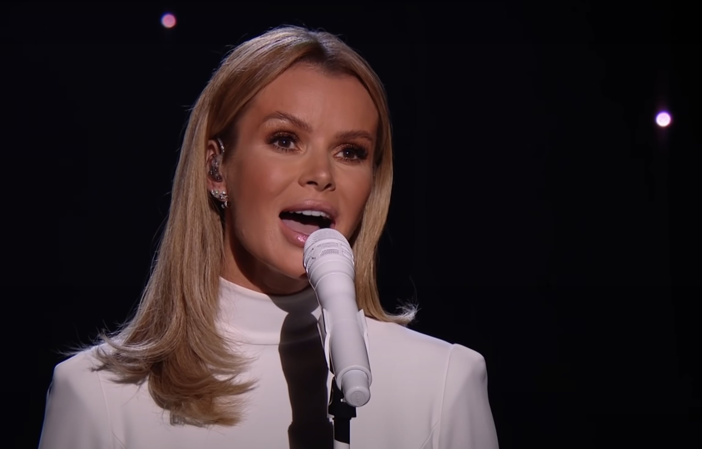 Amanda Holden singing on stage on Britain's Got Talent