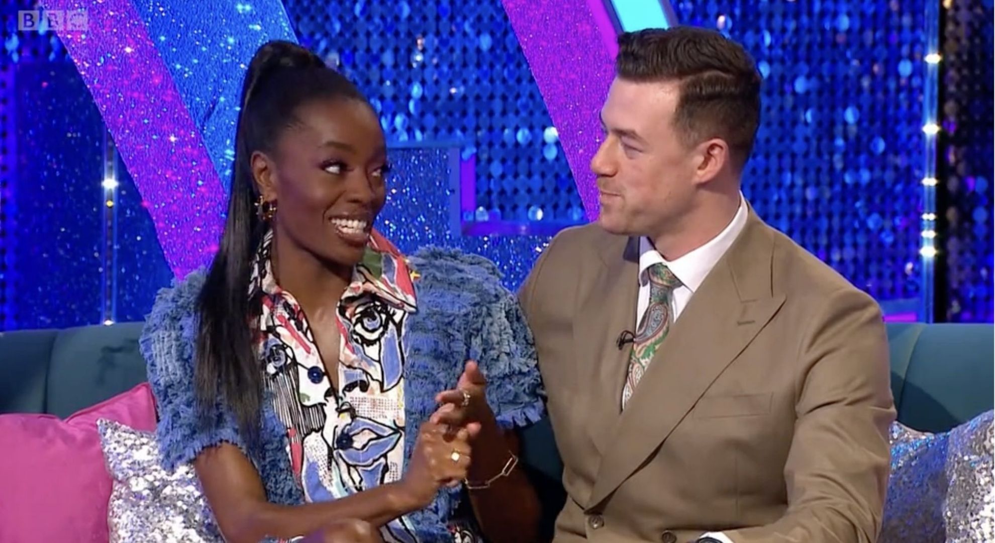 AJ Odudu and Kai Widdrington looking at each other