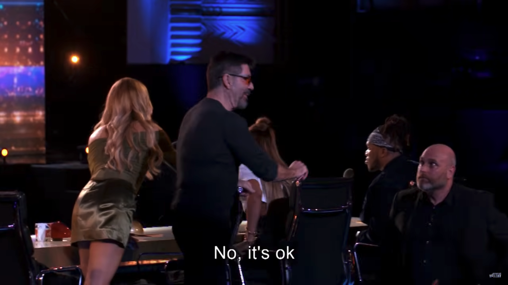 Simon Cowell speaking to security at BGT live audition