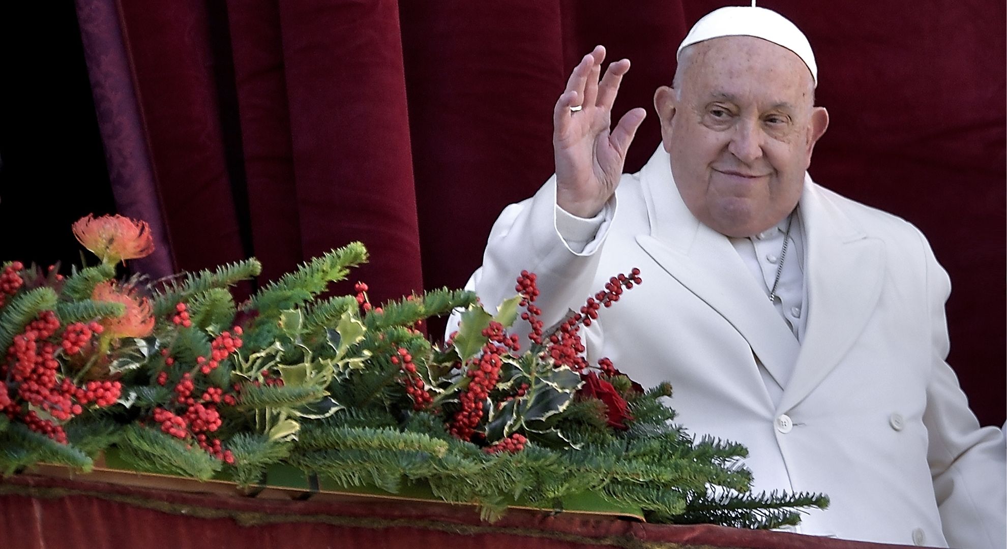 Pope Francis waving and smiling