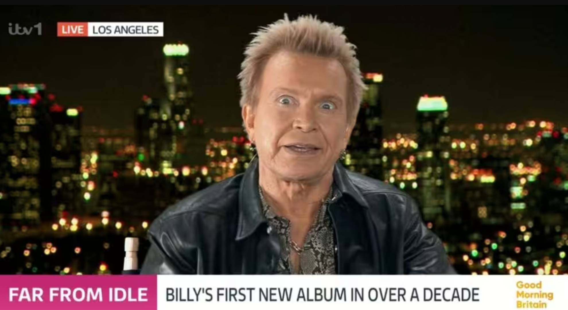 Billy Idol opens his eyes wide
