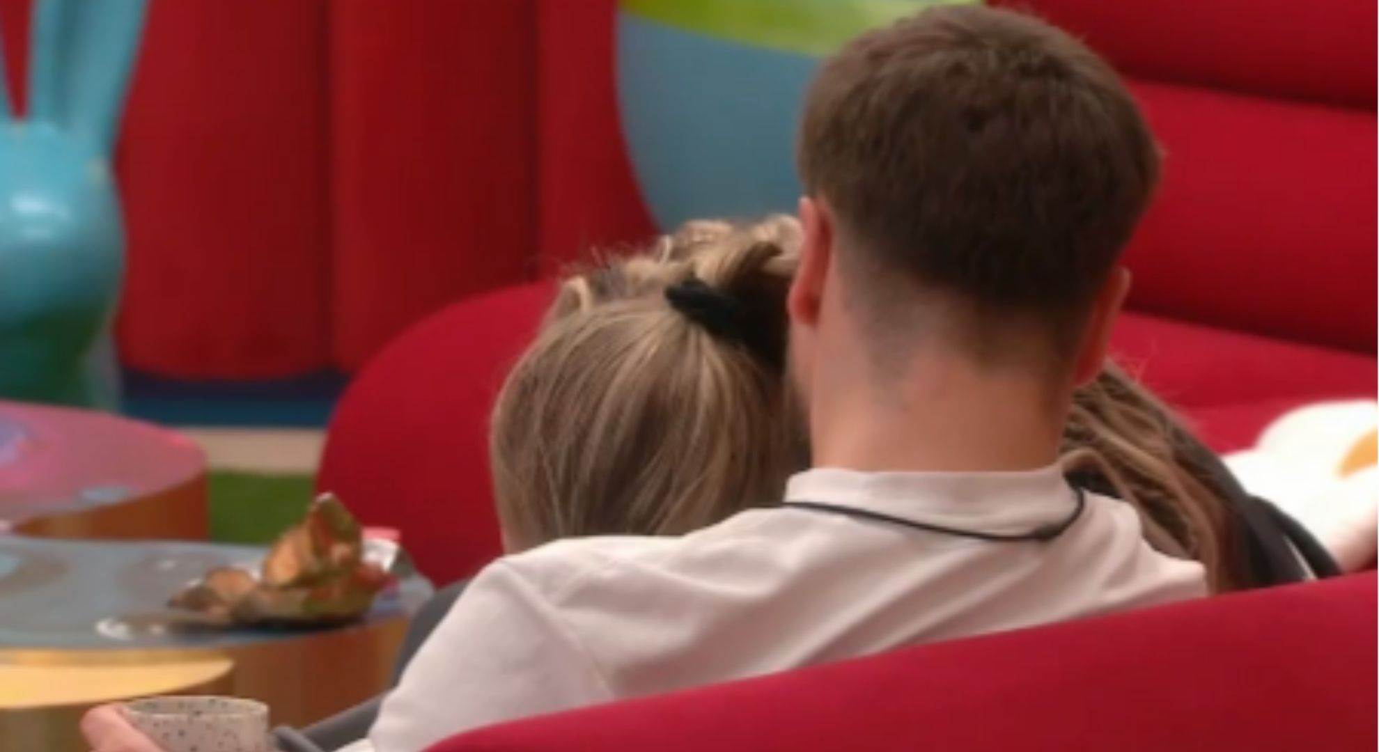 JoJo Siwa licking chocolate off Chris Hughes