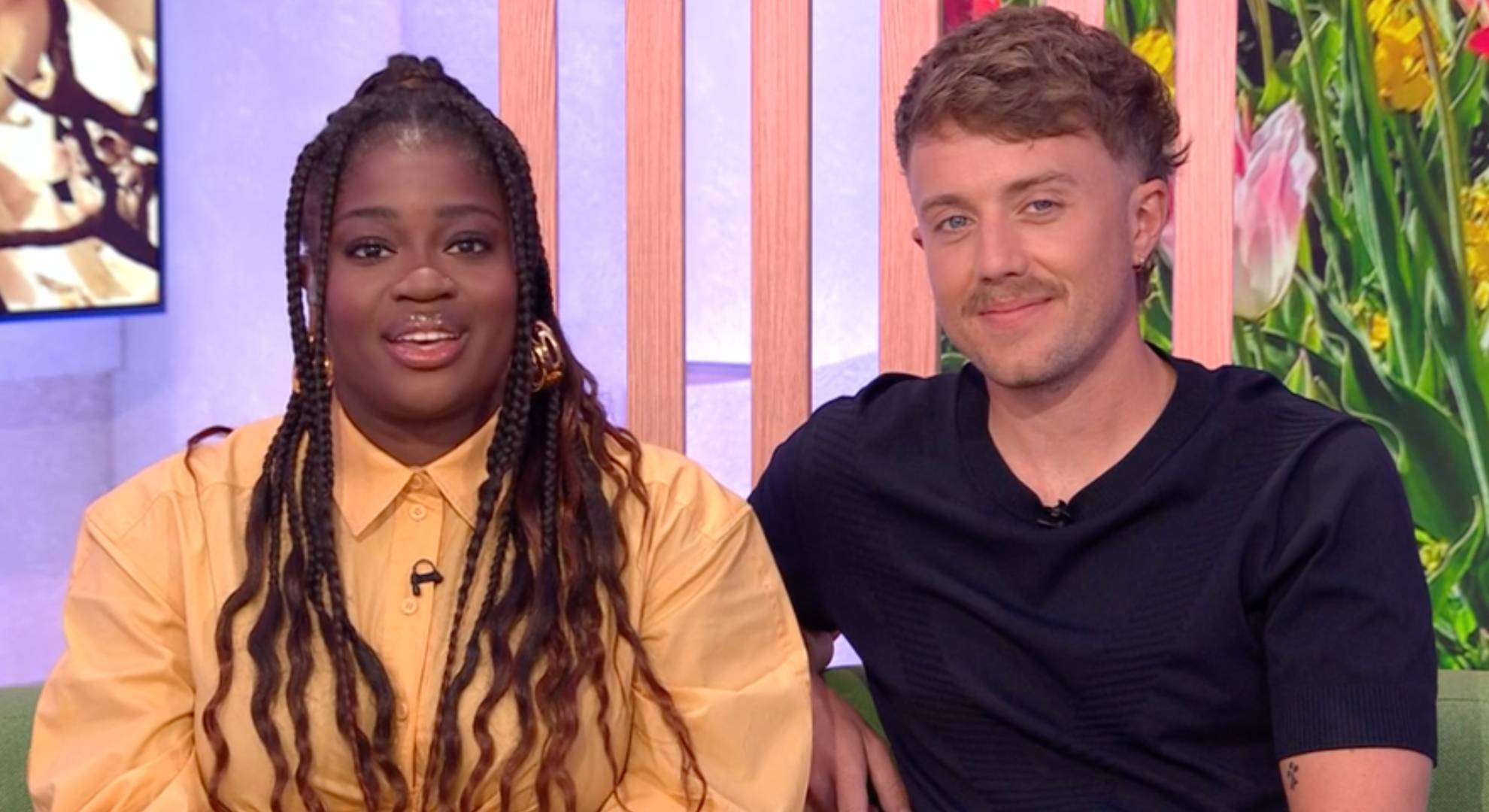 Roman Kemp sits with Clara Amfo