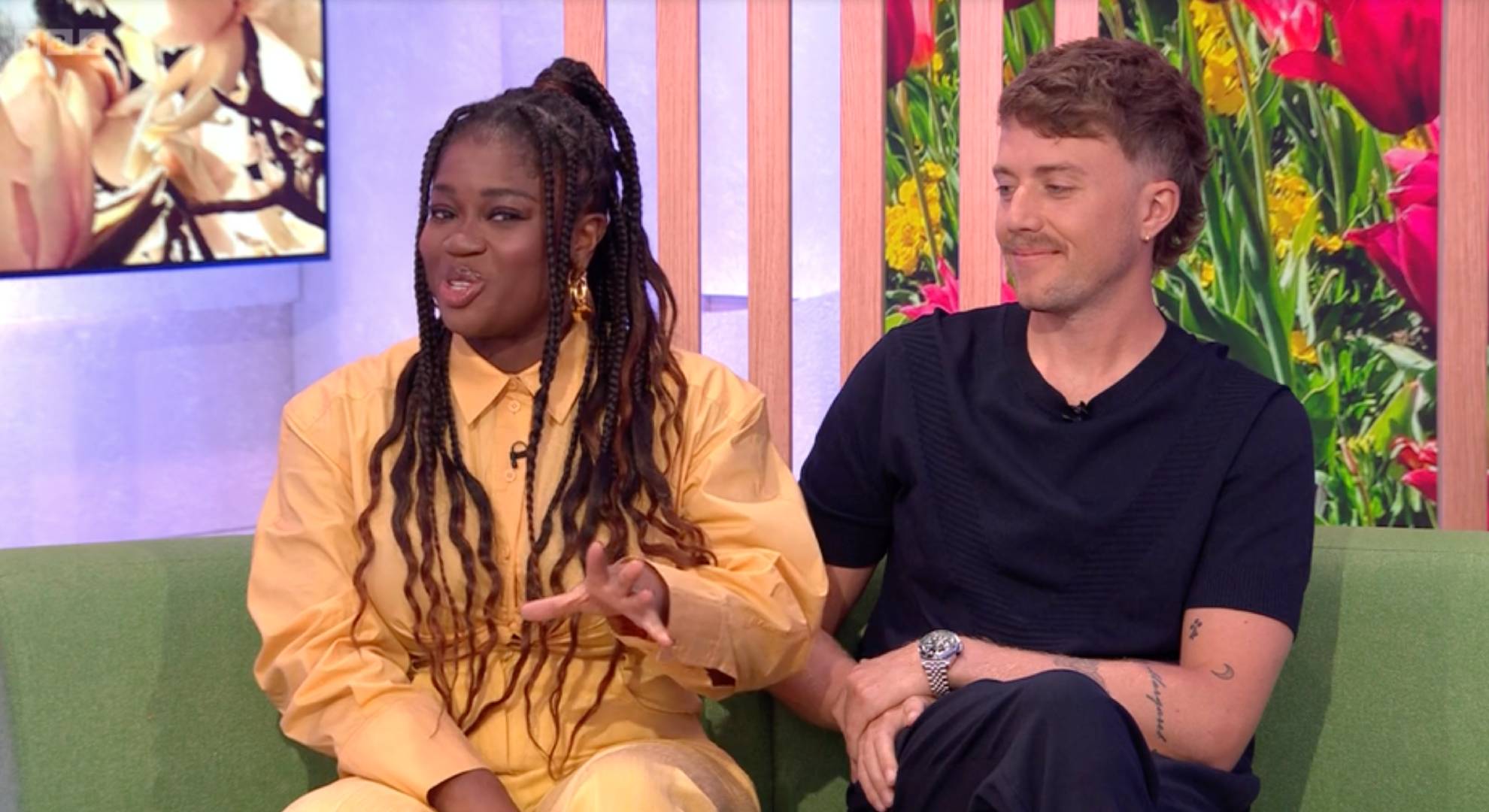 Roman Kemp sits with Clara Amfo